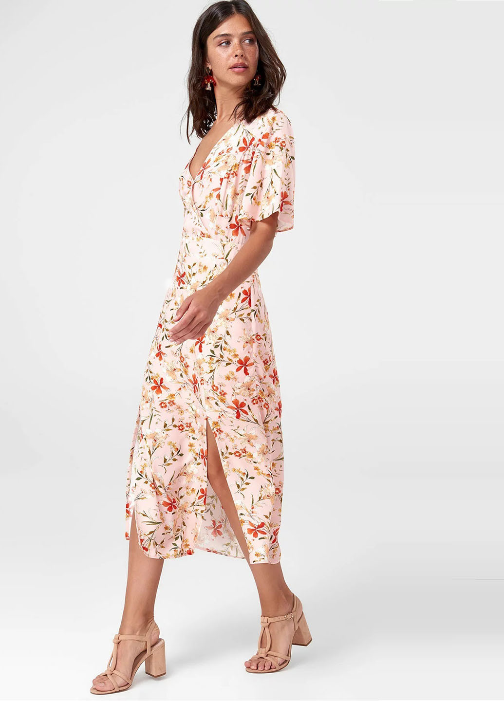 Світло-рожева кежуал сукня на запах Trendyol з квітковим принтом