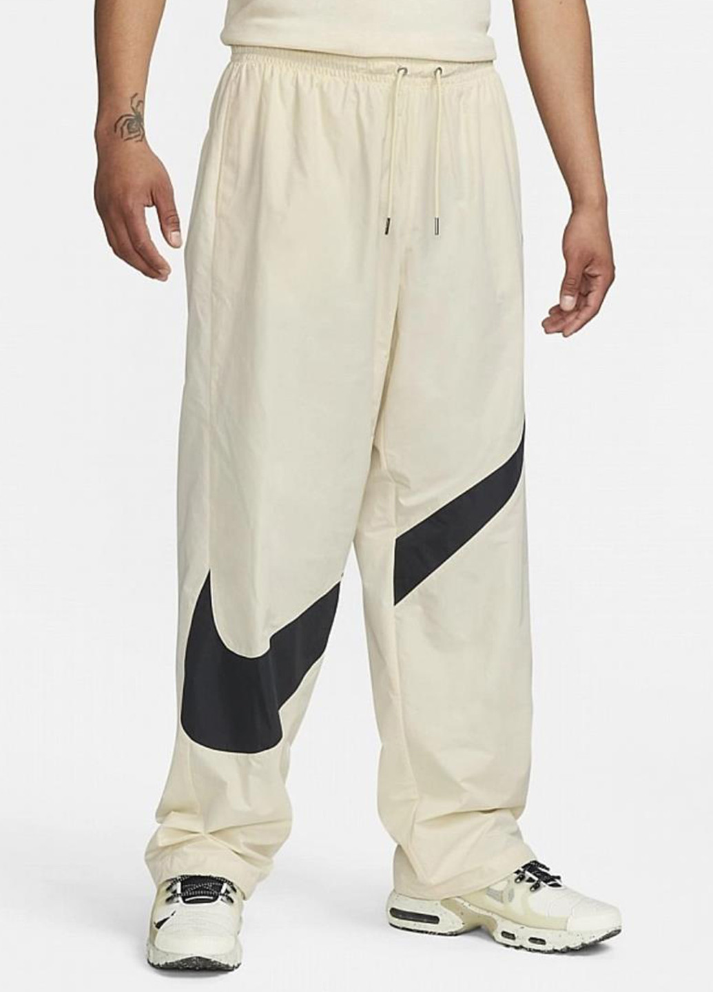 Бежевые спортивные демисезонные прямые брюки Nike