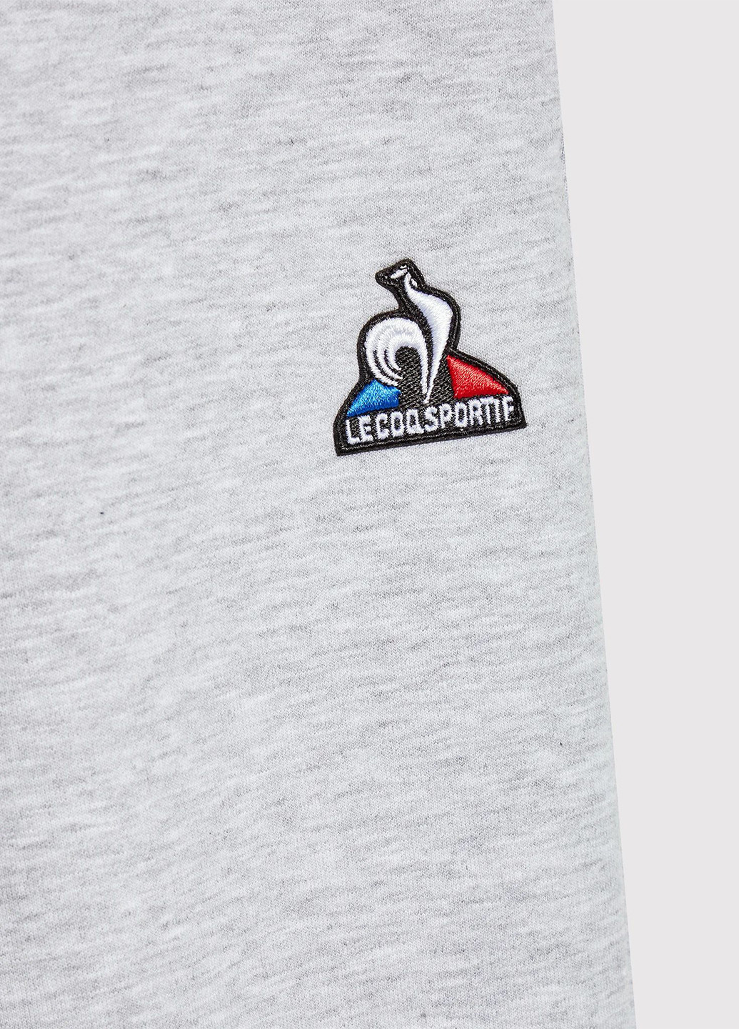 Светло-серые спортивные демисезонные брюки джоггеры Le Coq Sportif