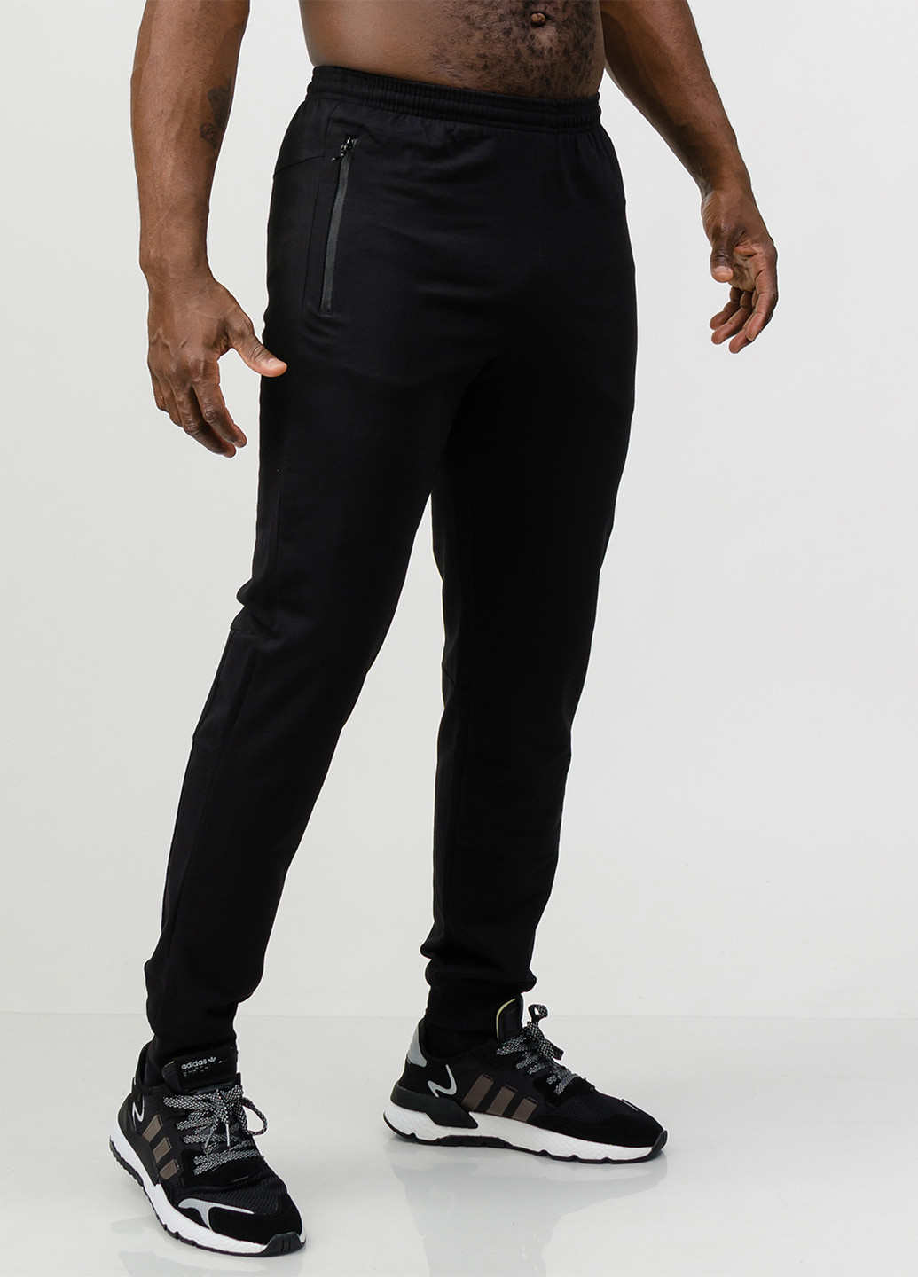 Черные спортивные демисезонные зауженные брюки Go Fitness