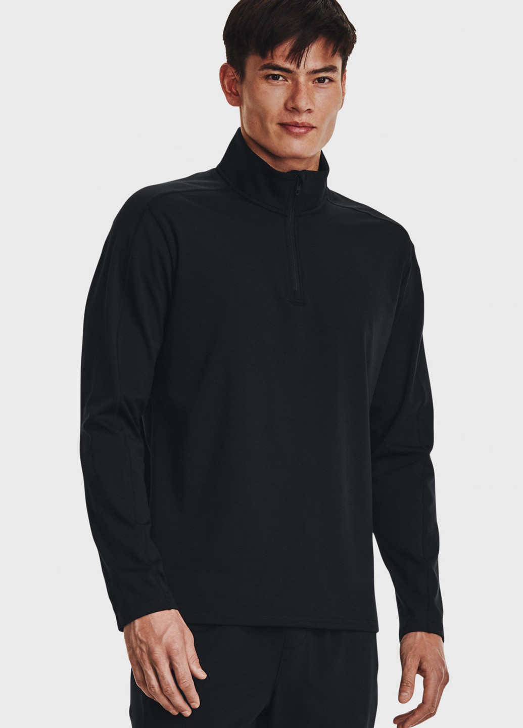 Черный демисезонный спортивный лонгслив Under Armour однотонный