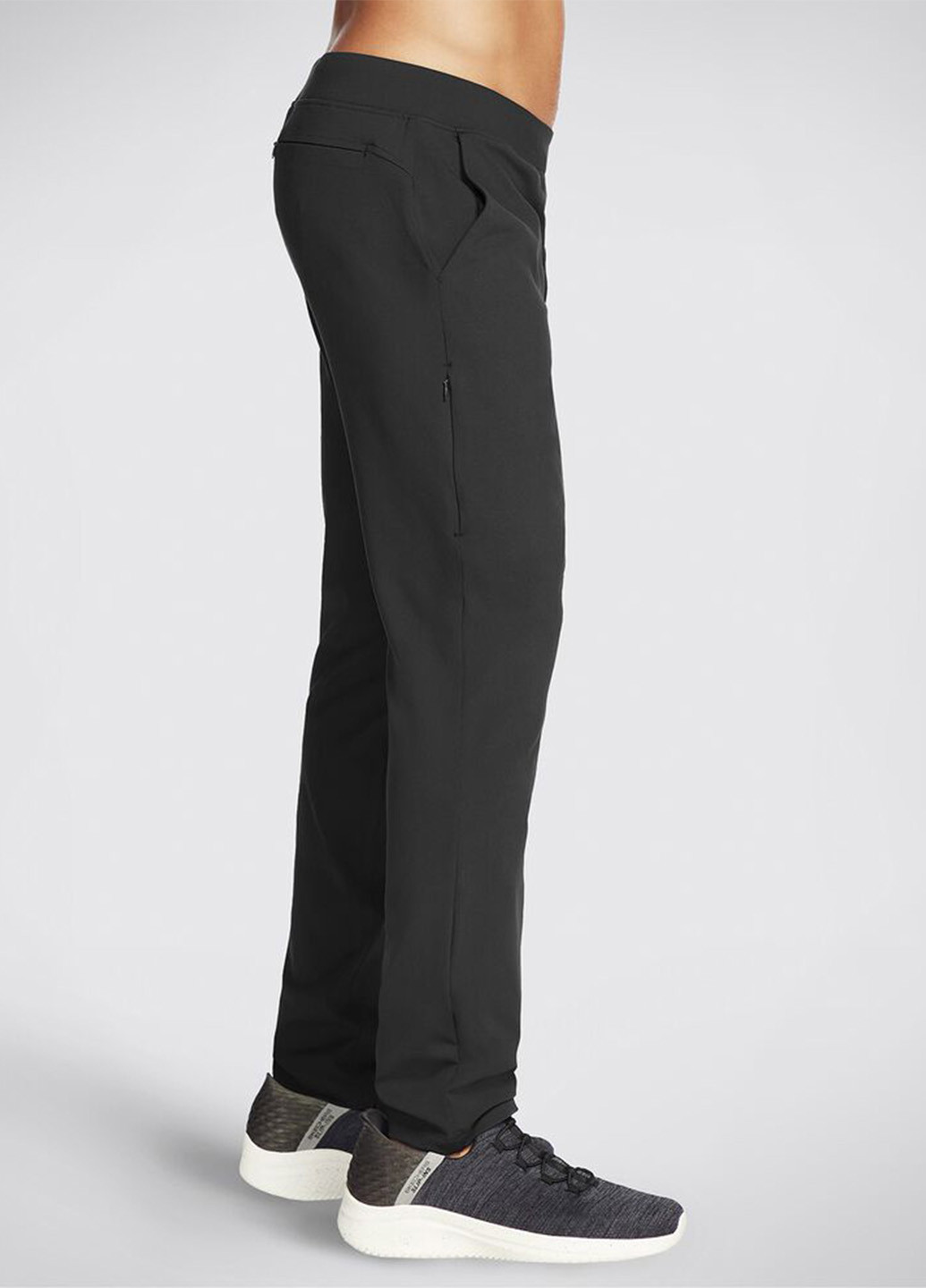 Черные спортивные демисезонные зауженные брюки Skechers