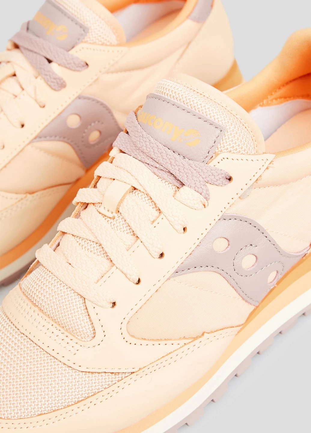 Персиковые кроссовки Jazz Triple из текстиля и замши Saucony розовые всесезоны (253268096)