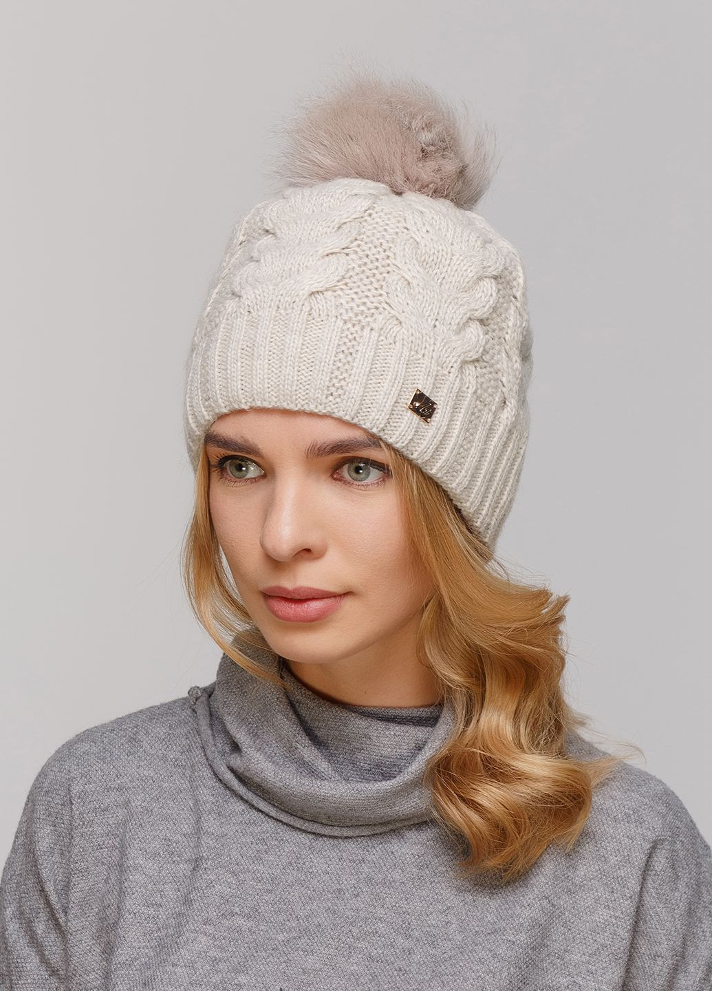 Зимняя теплая женская шапка на флисовой подкладке 550591 Merlini (249643285)