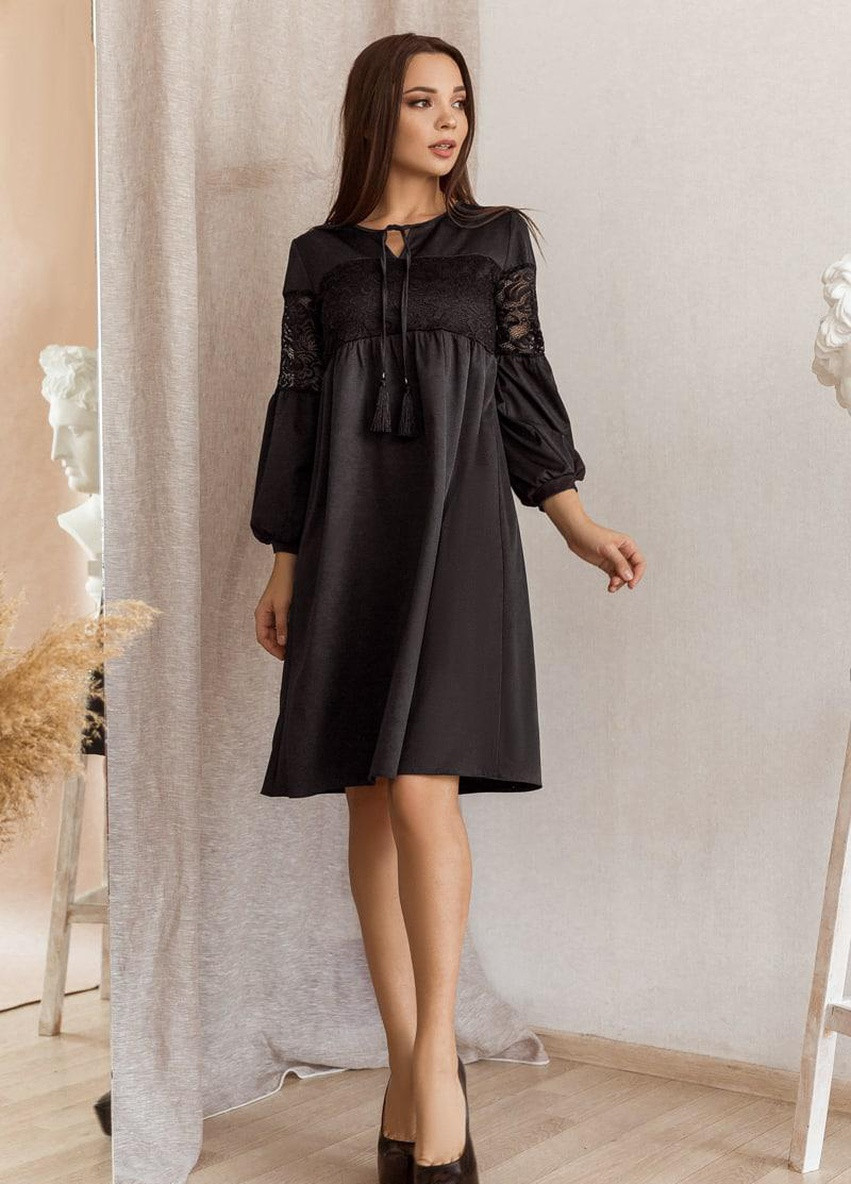 Чорна женское платье свободного кроя с декоративнми шнурками черного цвета размер норма 374640 New Trend