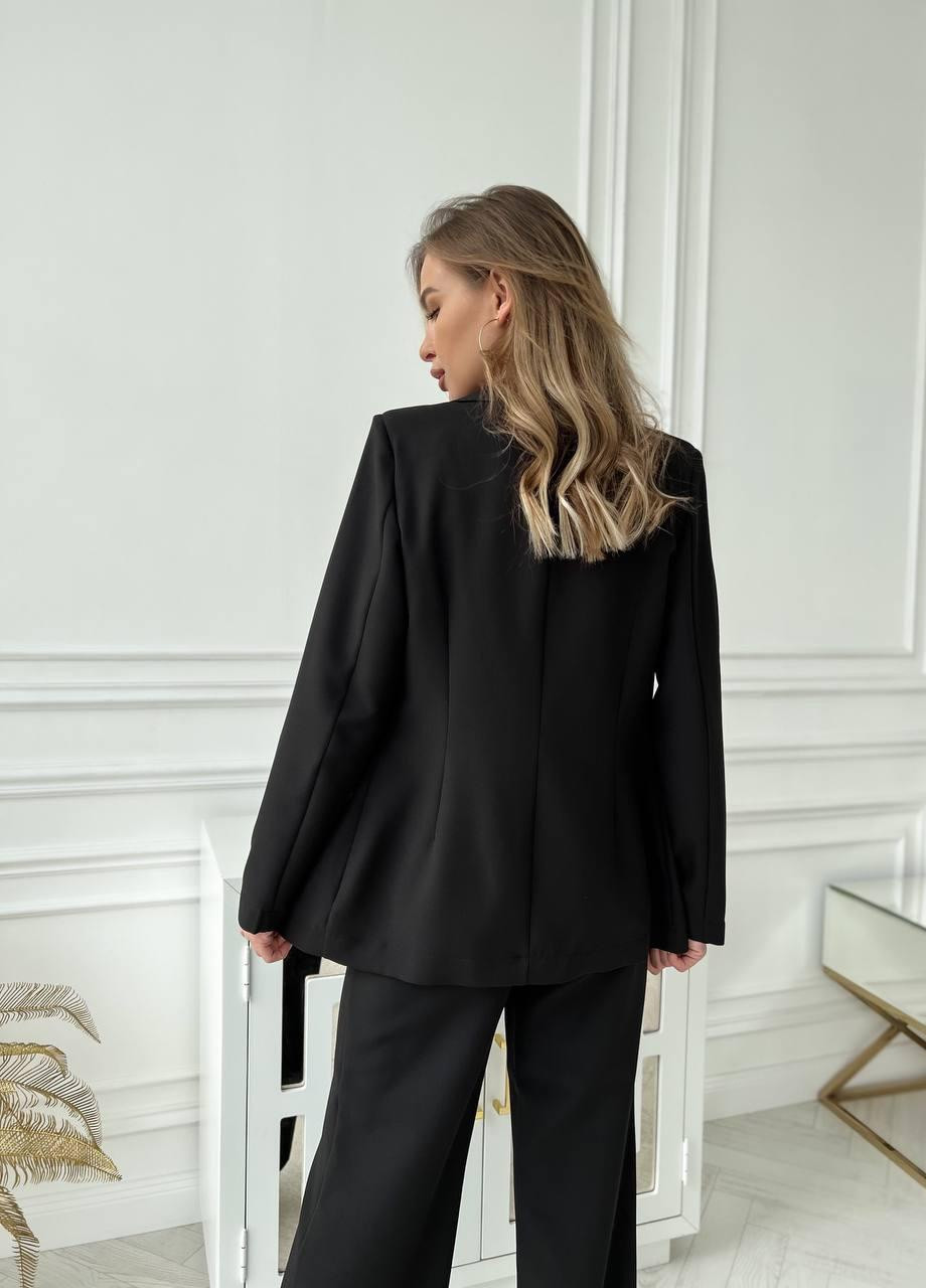 Женский костюм пиджак и брюки палаццо из костюмной ткани черного цвета р.42 363164 New Trend (256038144)