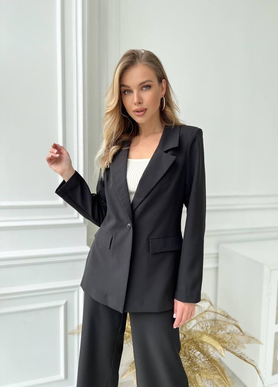 Жіночий костюм піджак та штани палаццо з костюмної тканини чорного кольору р.42 363164 New Trend (256038144)