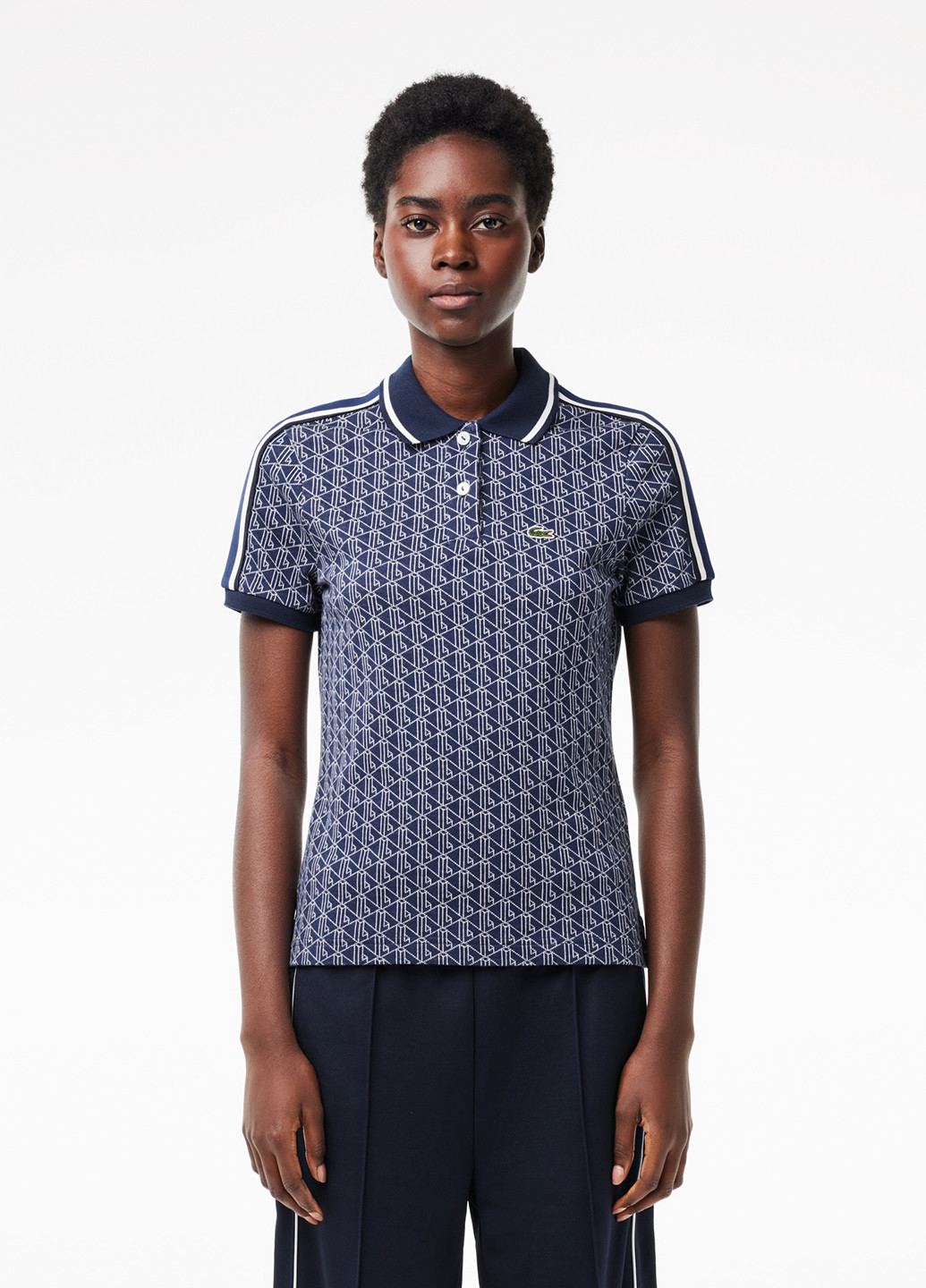 Синяя женская футболка-поло Lacoste с геометрическим узором