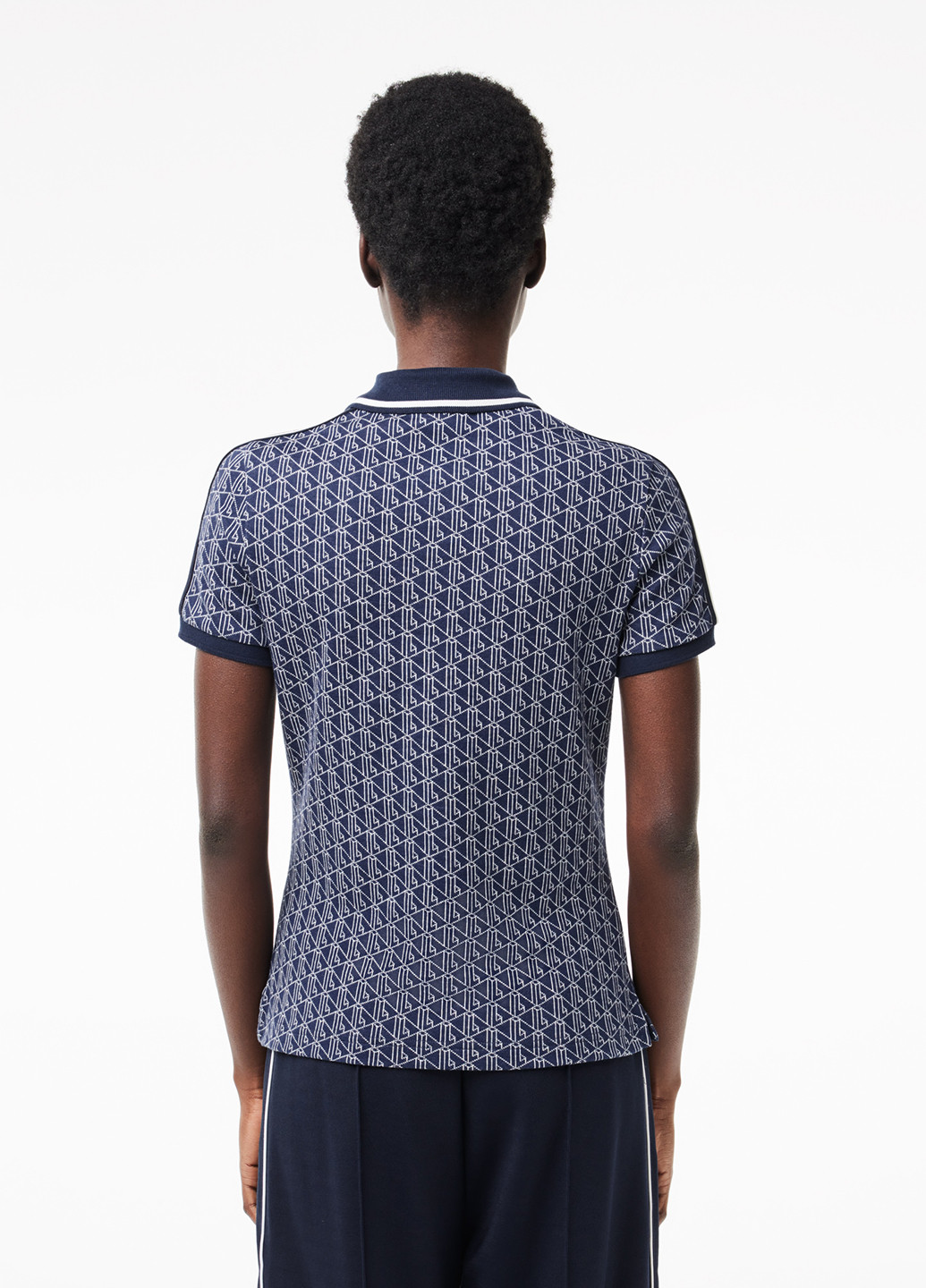 Синяя женская футболка-поло Lacoste с геометрическим узором