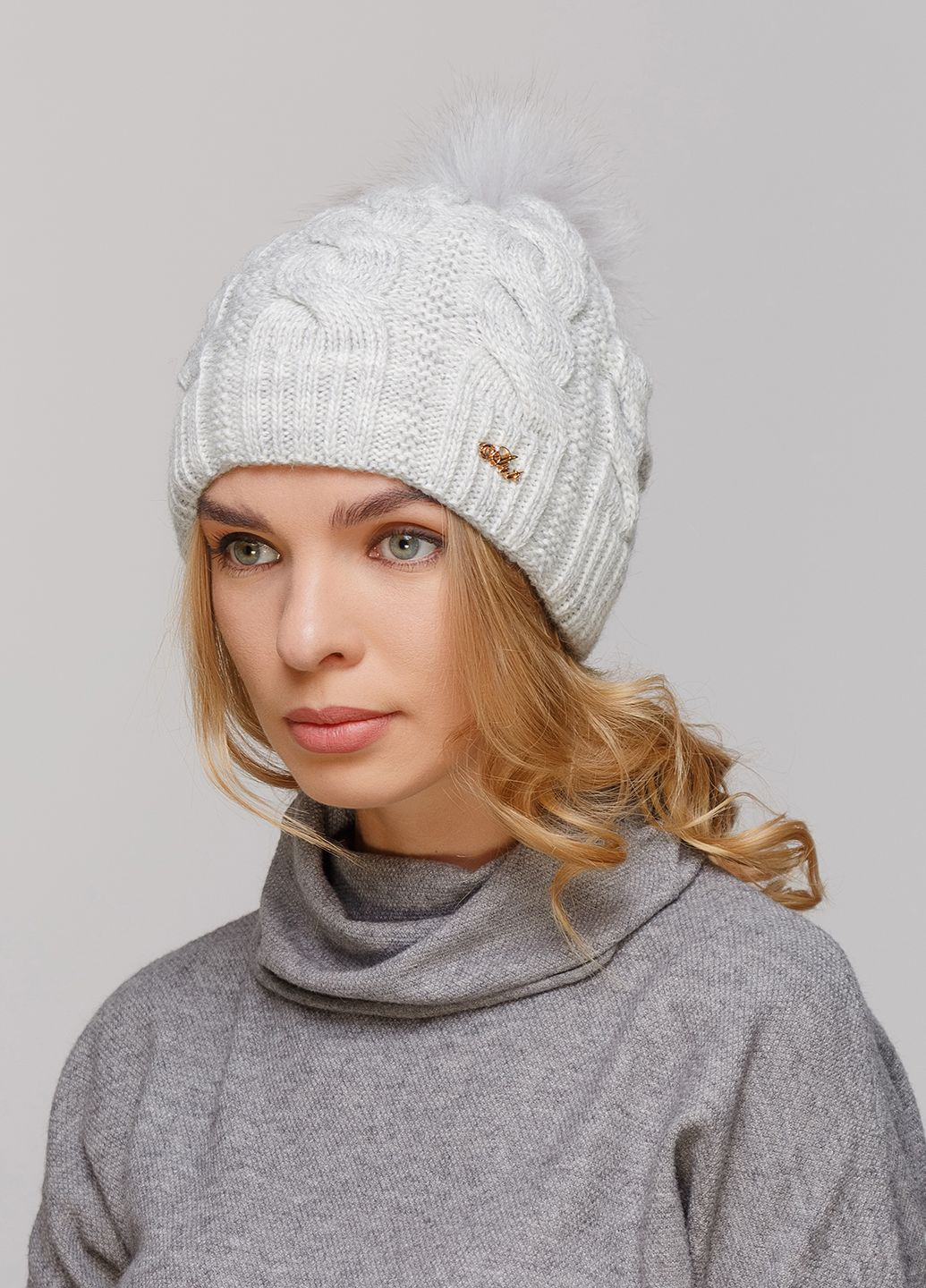Зимняя теплая женская шапка на флисовой подкладке 550658 Merlini (249643062)