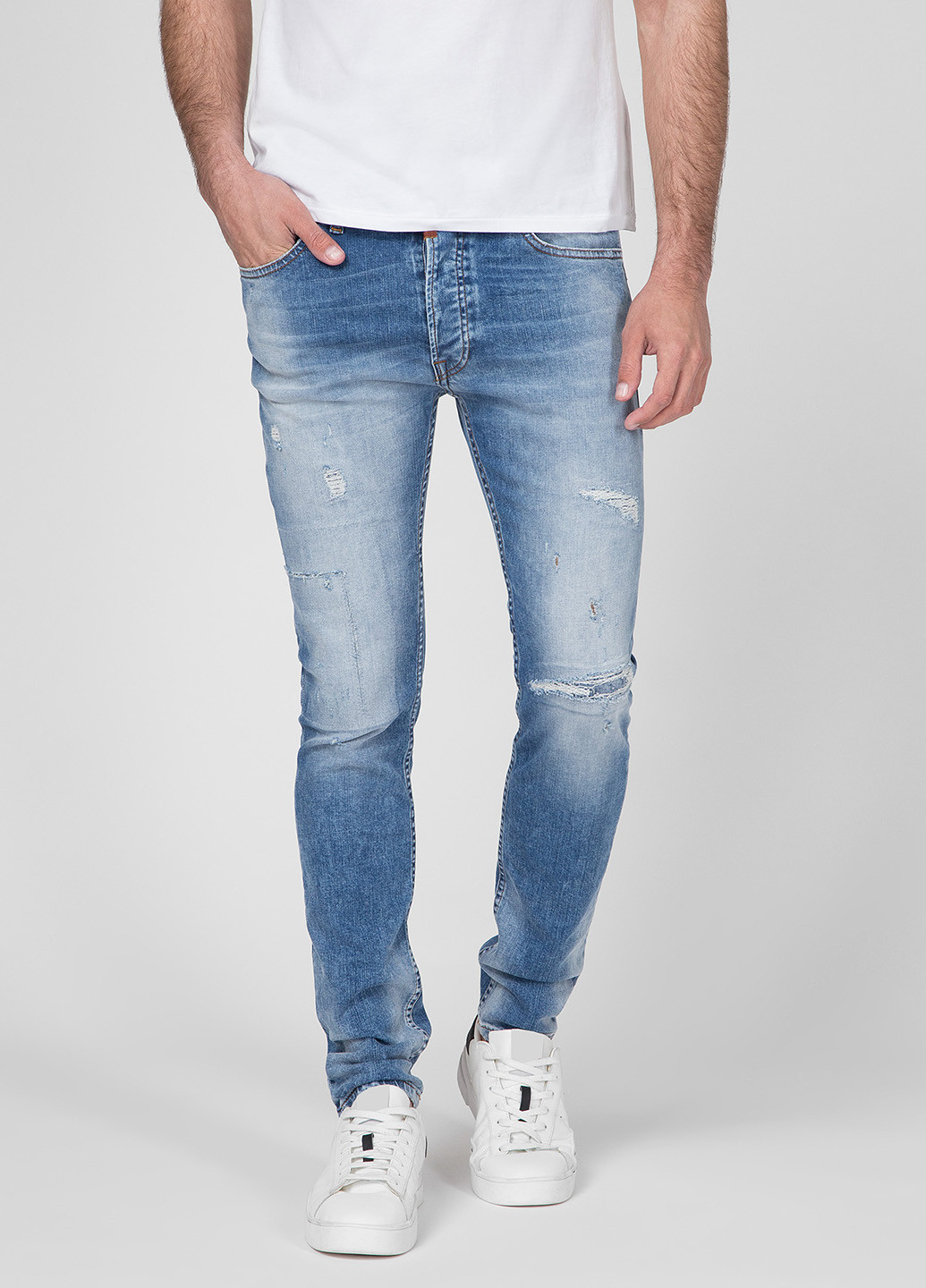 Голубые демисезонные зауженные джинсы Tigha