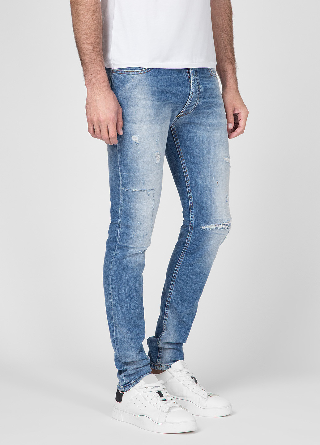 Голубые демисезонные зауженные джинсы Tigha