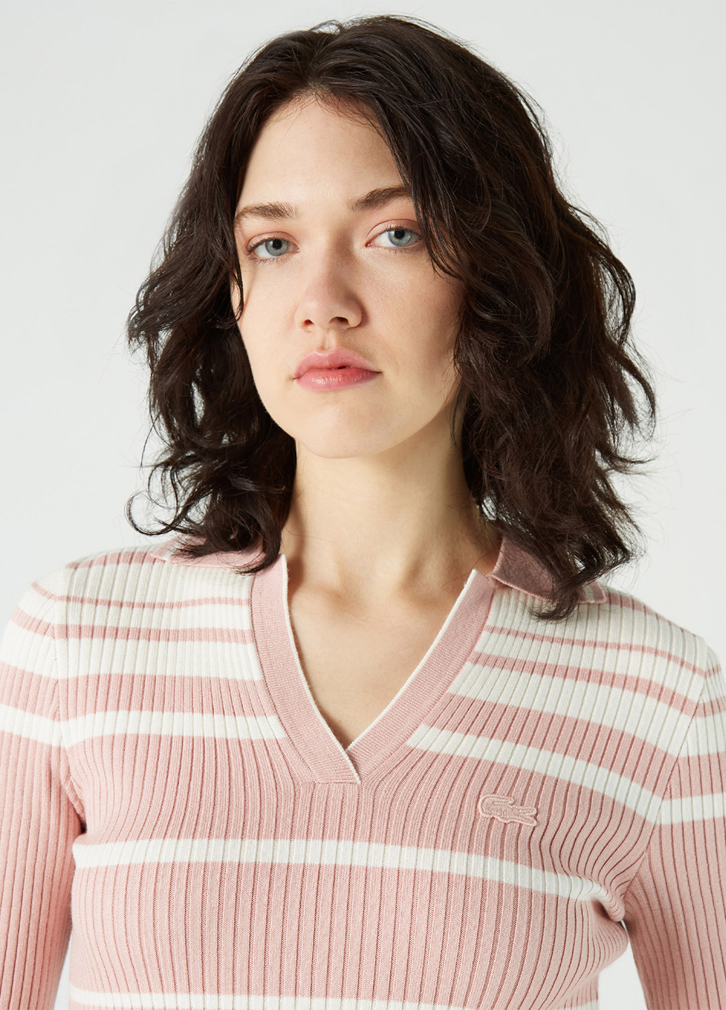 Розовый демисезонный свитер Lacoste
