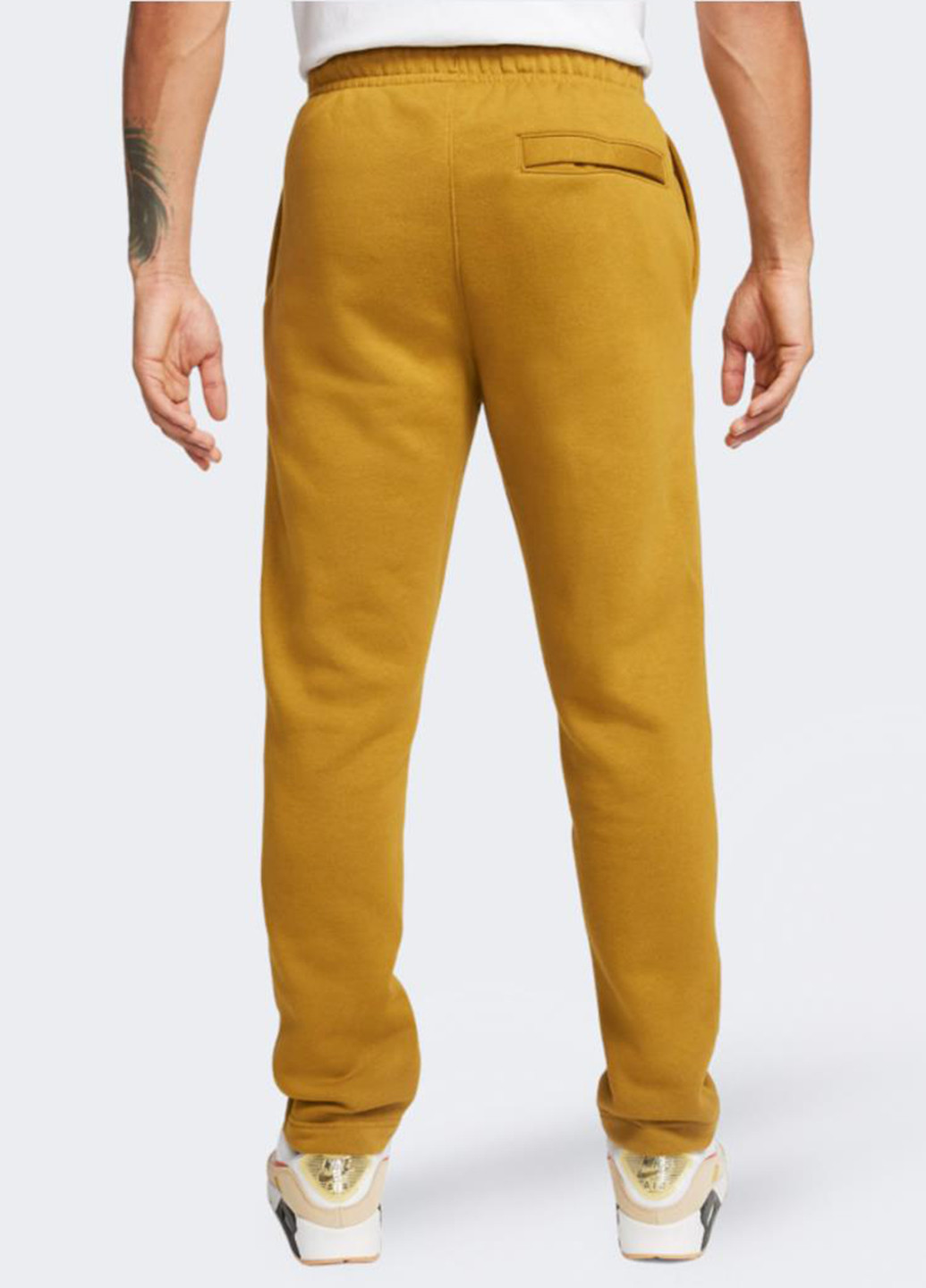 Горчичные спортивные демисезонные зауженные брюки Nike