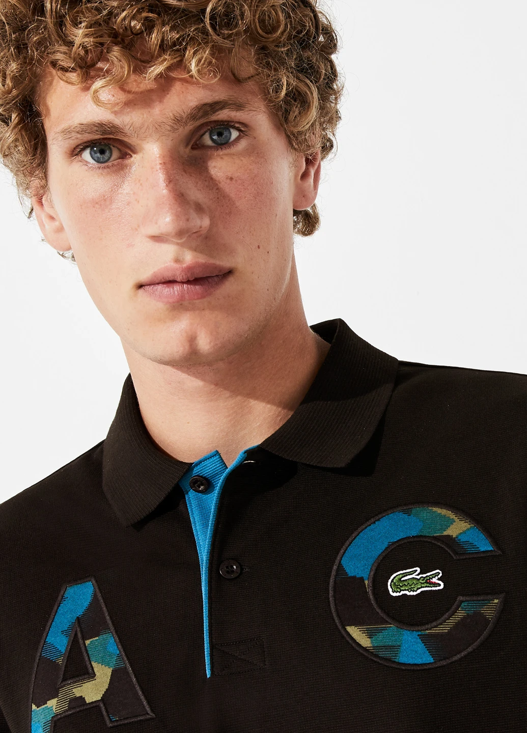 Черная футболка-поло для мужчин Lacoste однотонная