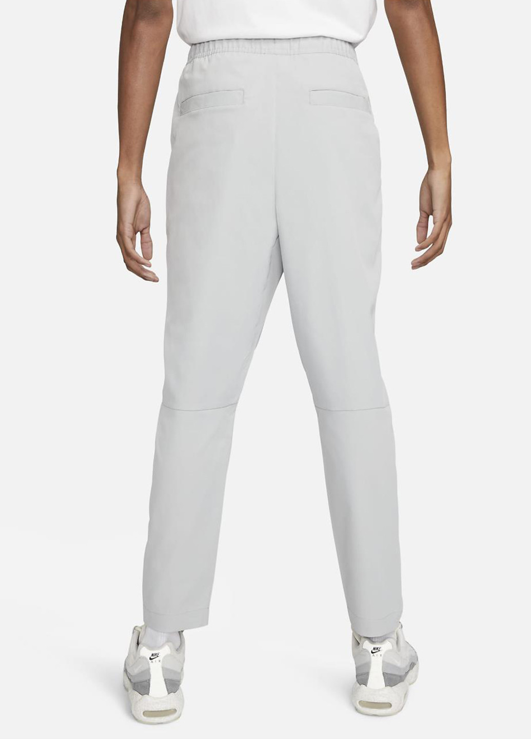 Светло-серые спортивные демисезонные прямые брюки Nike