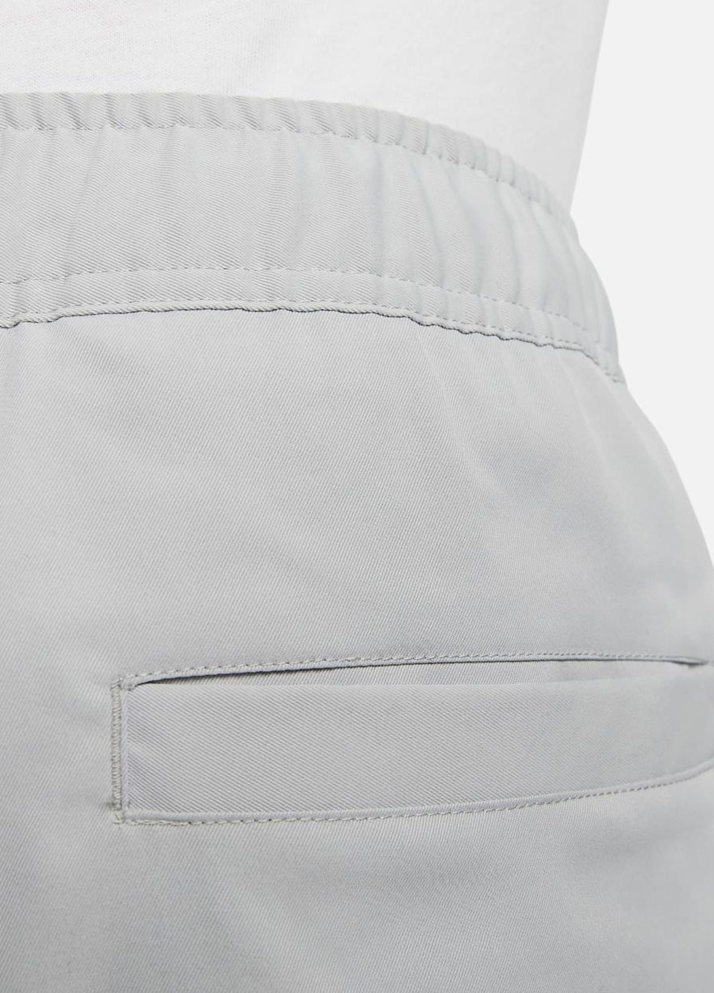 Светло-серые спортивные демисезонные прямые брюки Nike