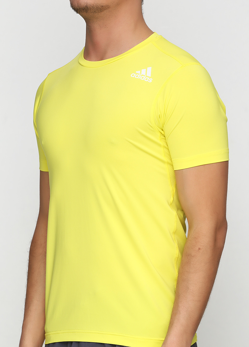 Жовта футболка з коротким рукавом adidas
