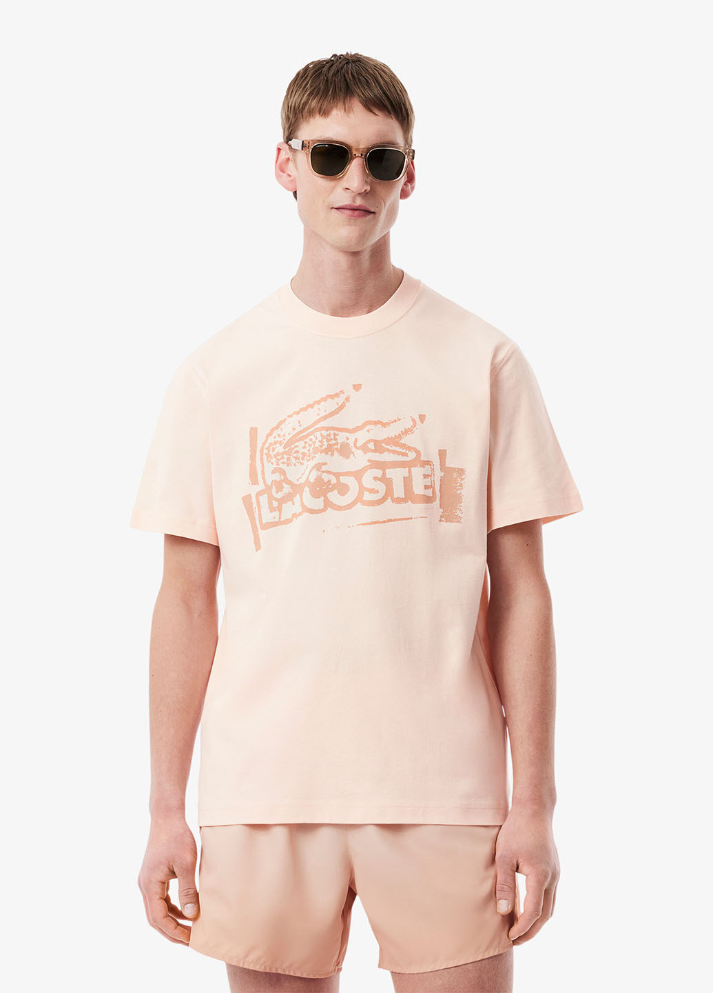 Бледно-розовая футболка Lacoste