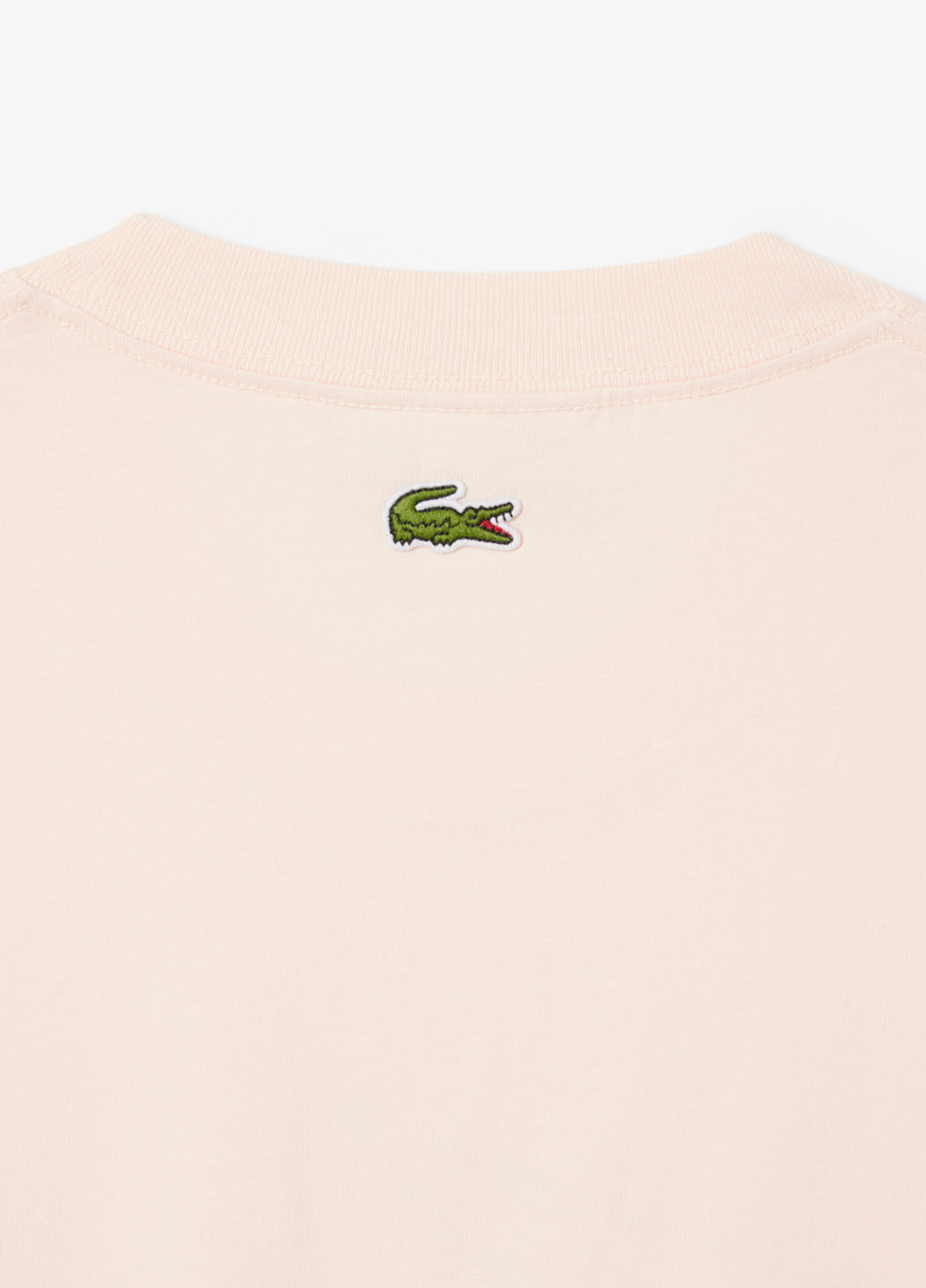 Бледно-розовая футболка Lacoste