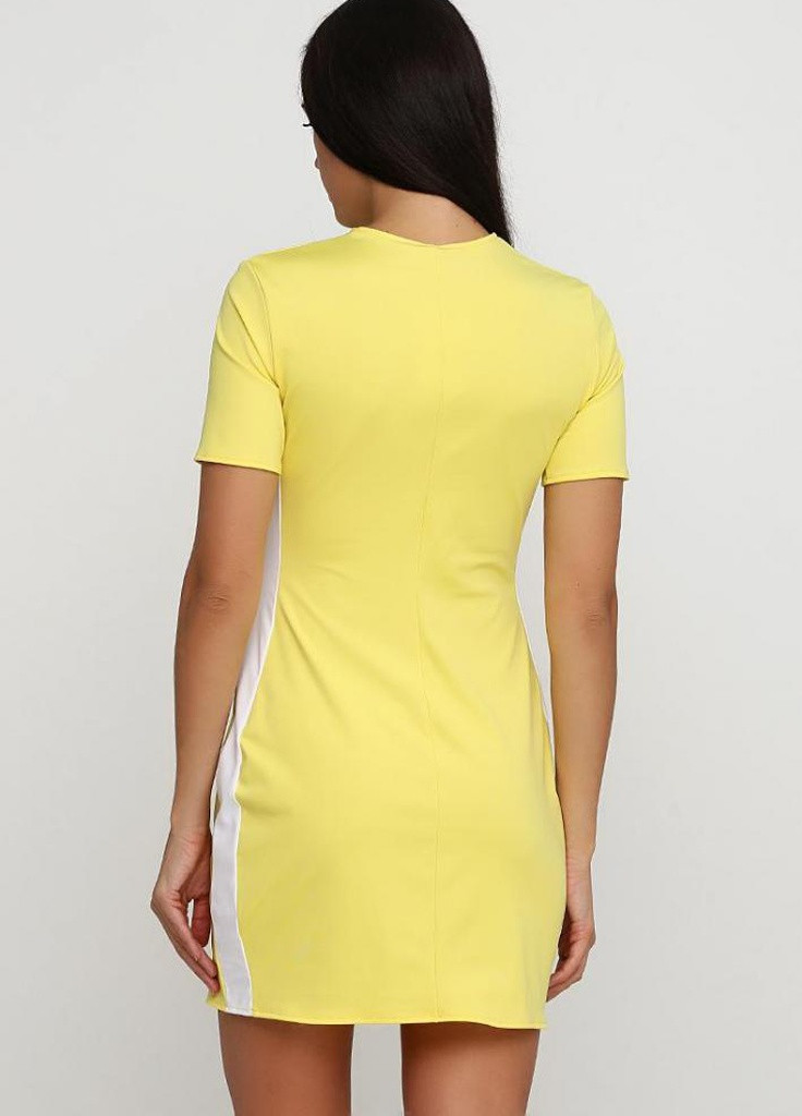 Жовтий кежуал зручне приталене стрейчевий плаття спортивного стилю mira жовтий / білий Podium однотонна