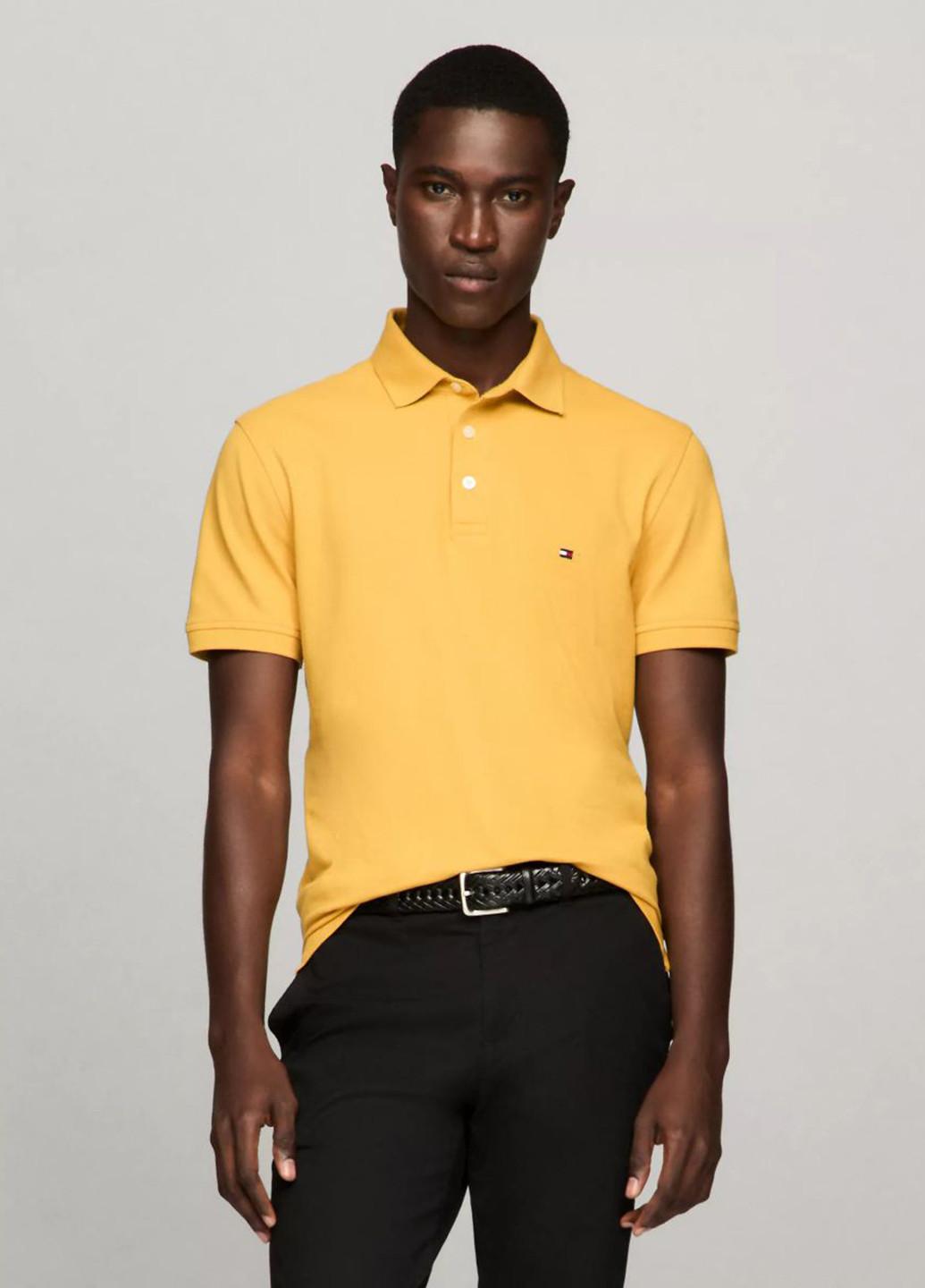Желтая футболка-поло для мужчин Tommy Hilfiger однотонная