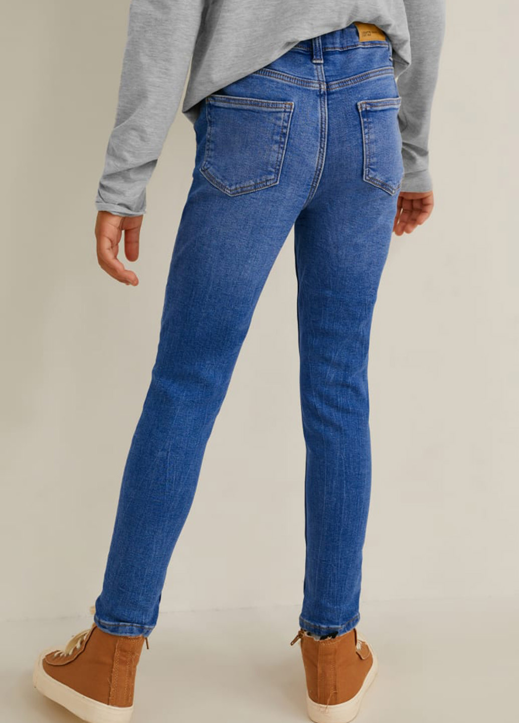 Голубые демисезонные зауженные джинсы C&A