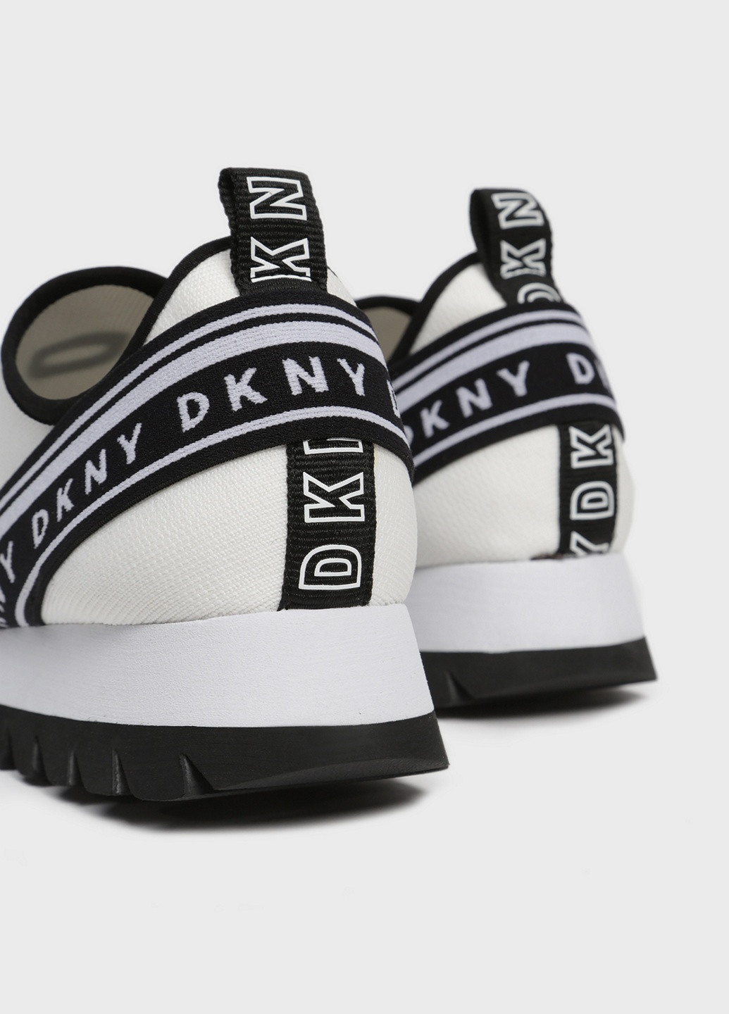 Білі осінні кросівки DKNY