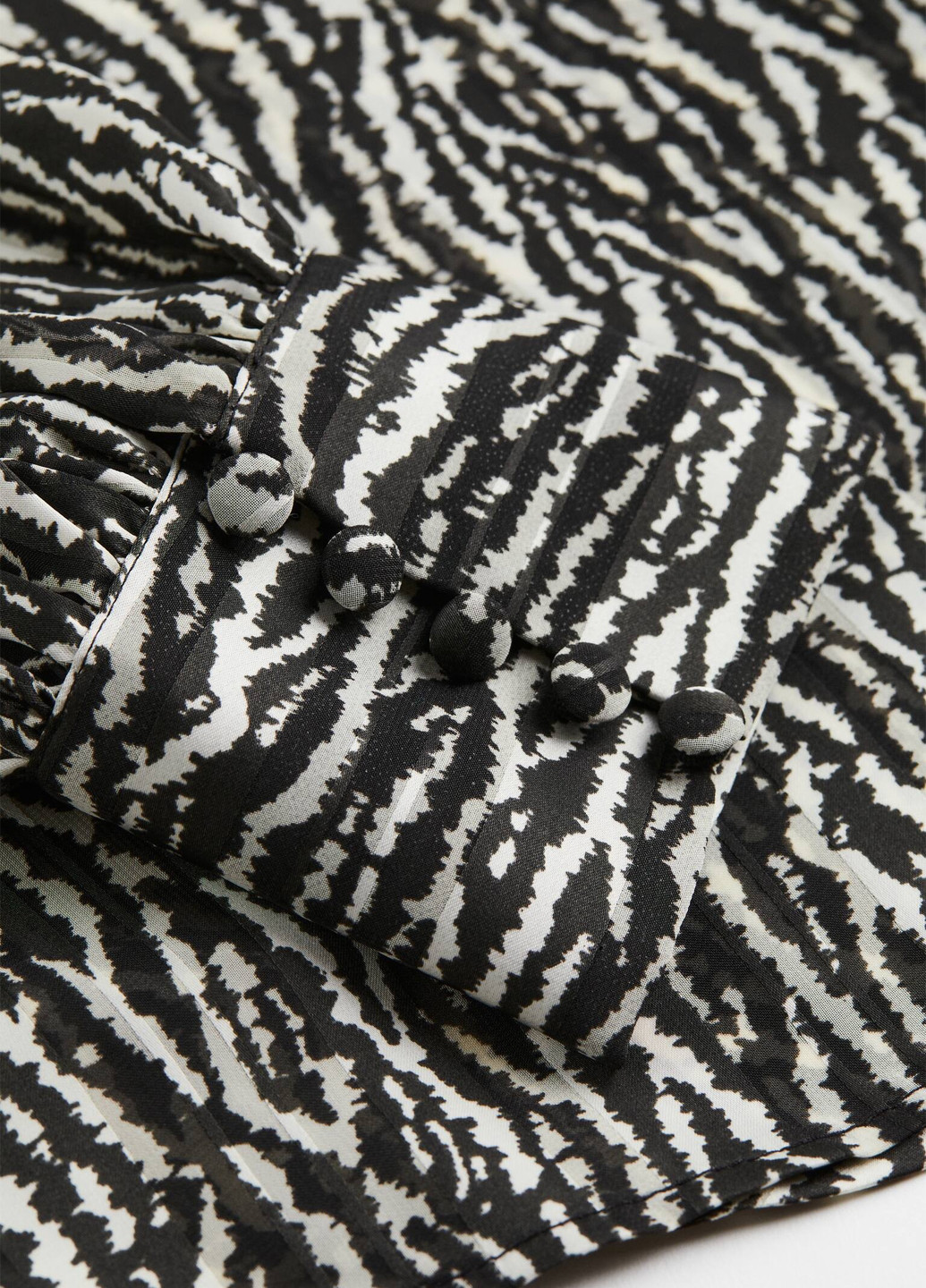 Чорно-біла блуза H&M