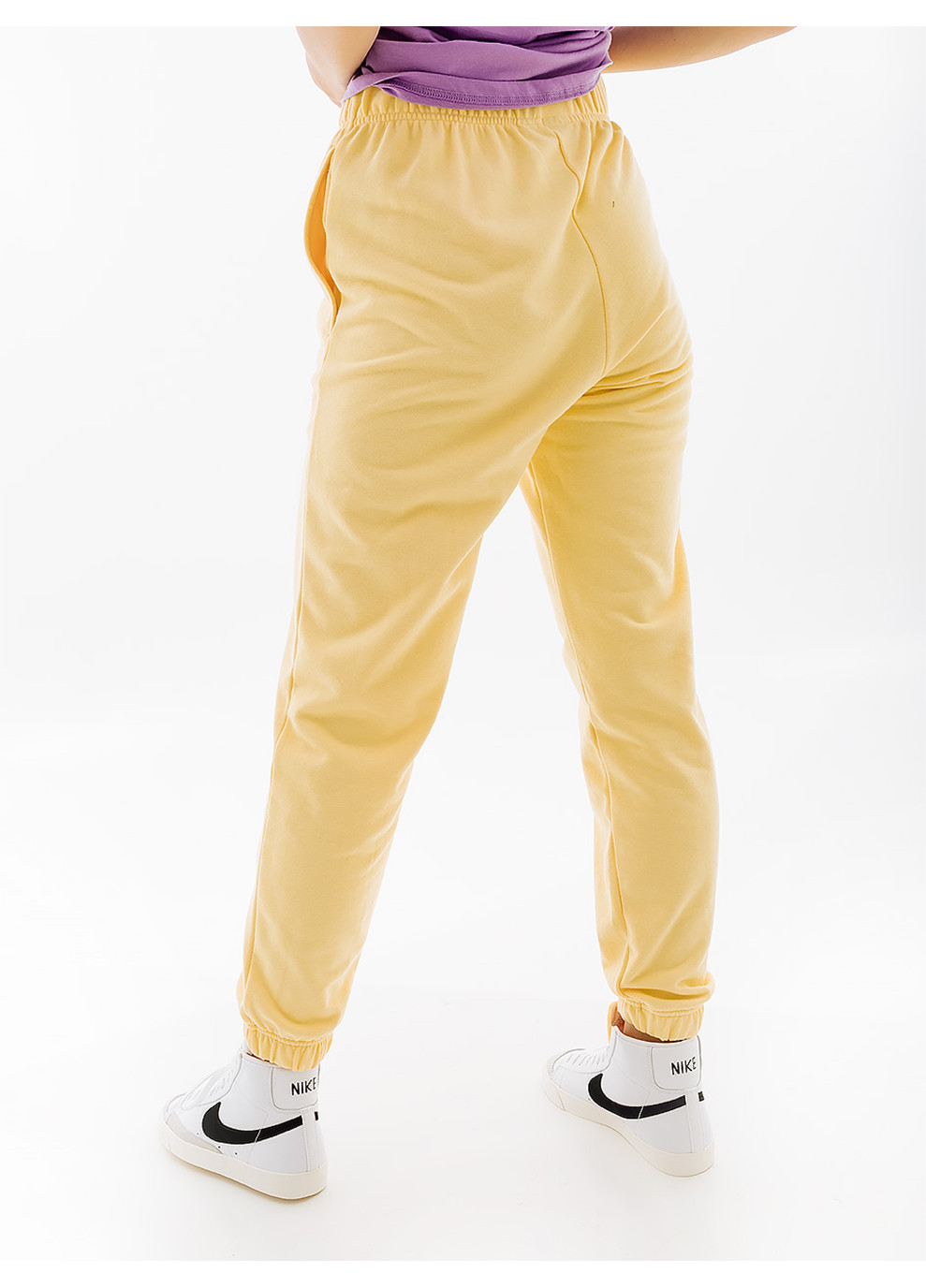 Желтые спортивные демисезонные брюки Helly Hansen