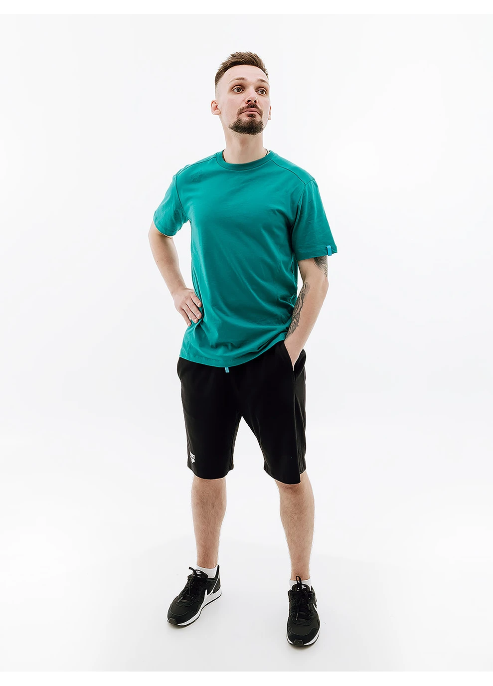 Зеленая мужская футболка team t-shirt panel зеленый Arena