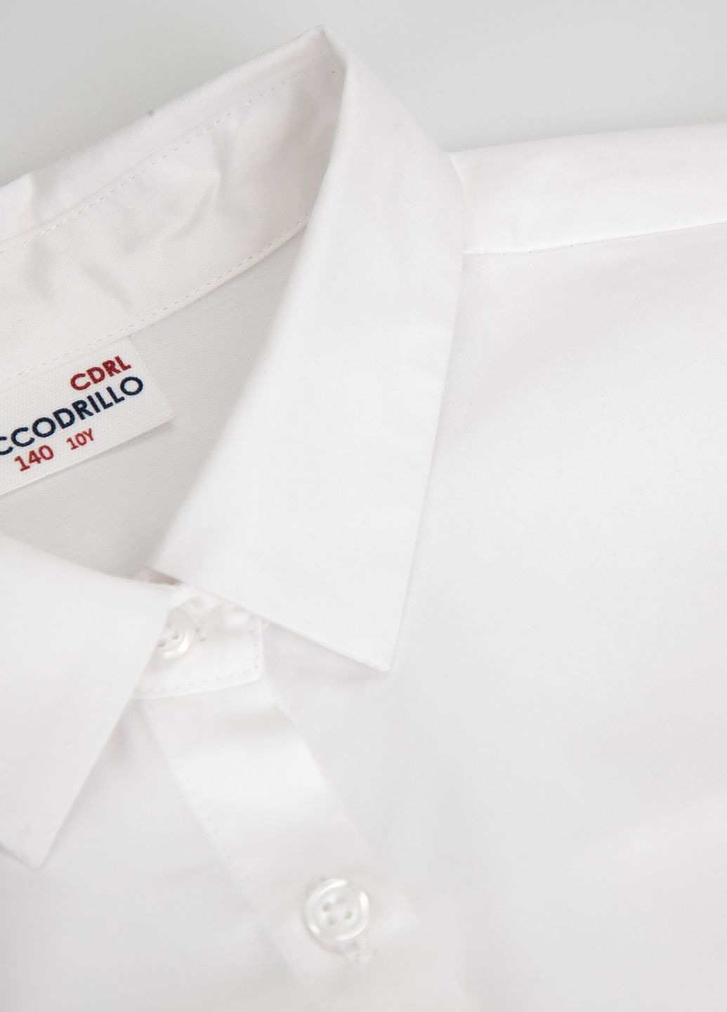 Белая блузка Coccodrillo