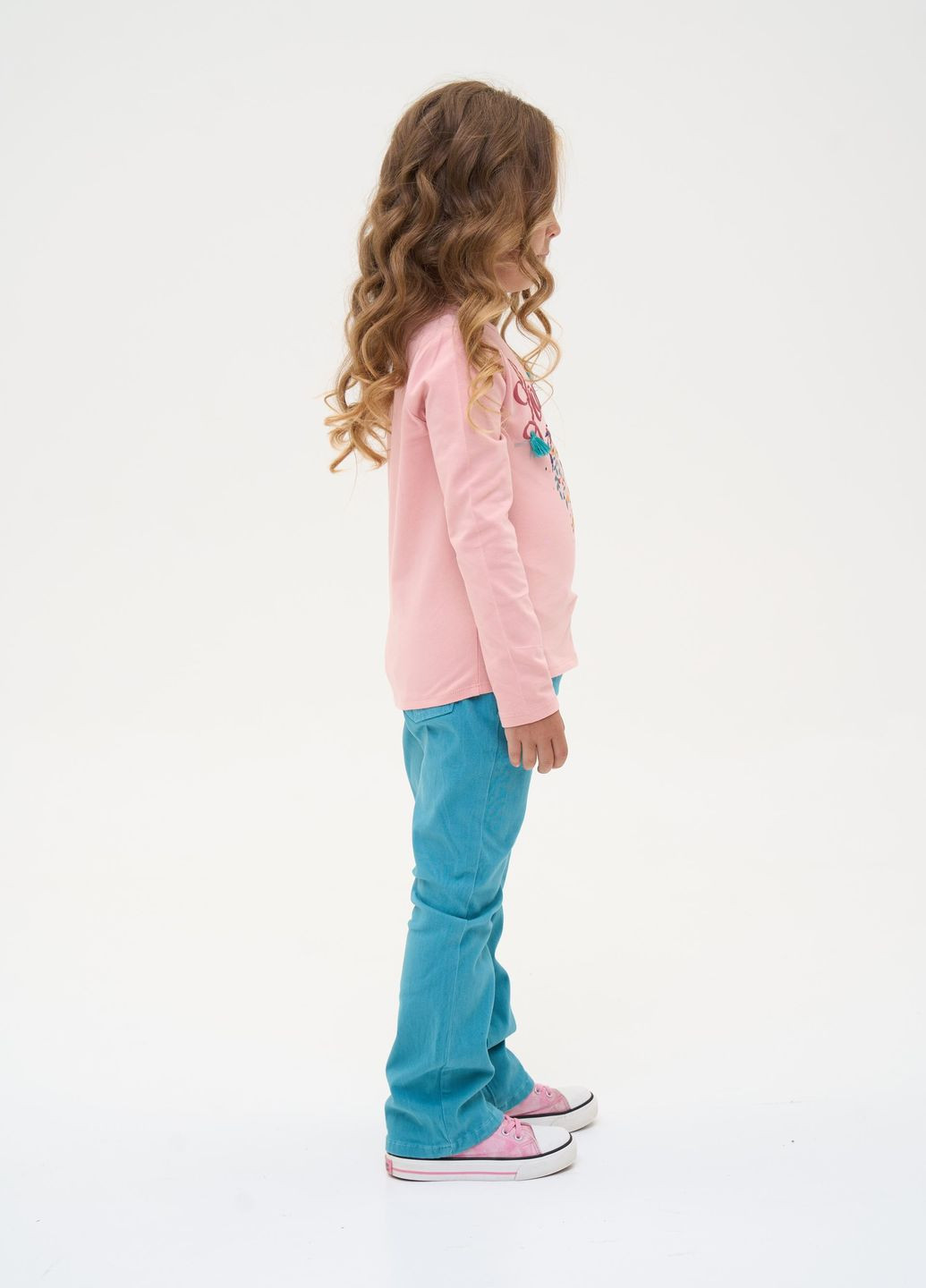 Рожевий демісезонний комплект для дівчинки: рожевий лонгслів та джинси брючний Yumster