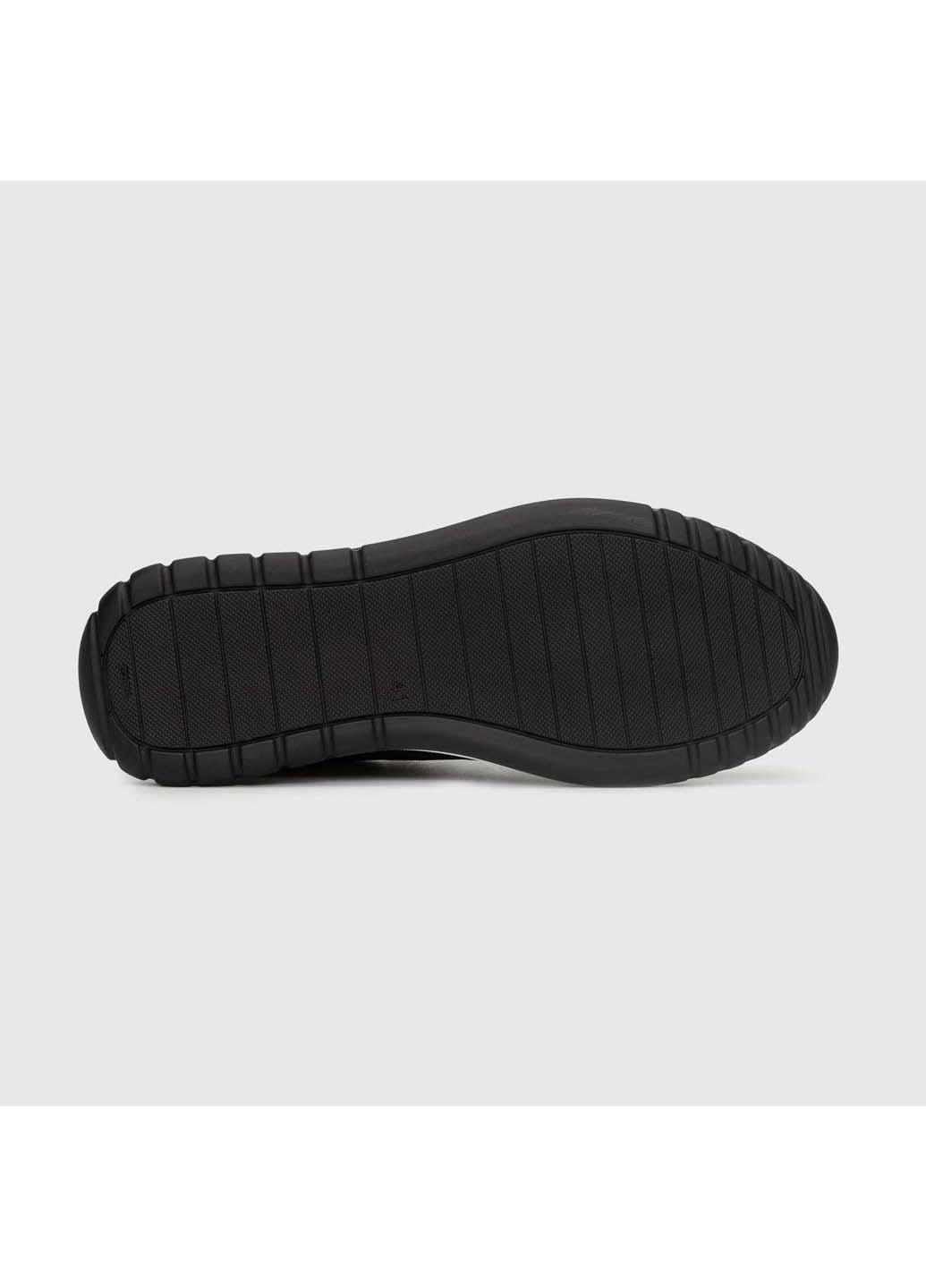 Черно-белые демисезонные кроссовки Konors