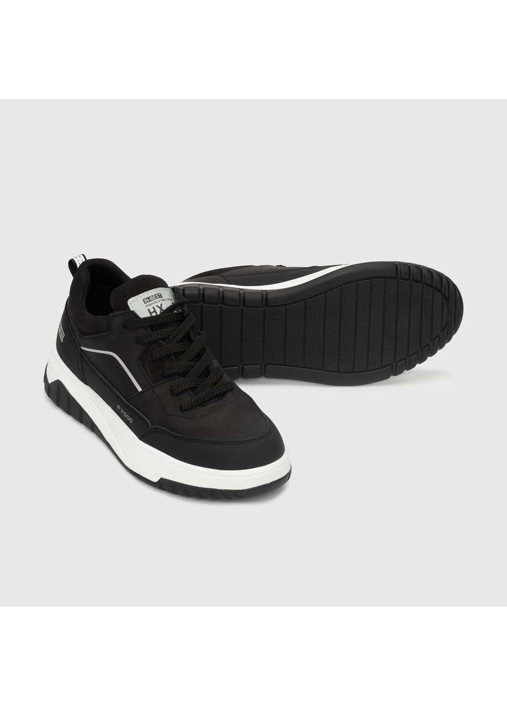 Черно-белые демисезонные кроссовки Konors