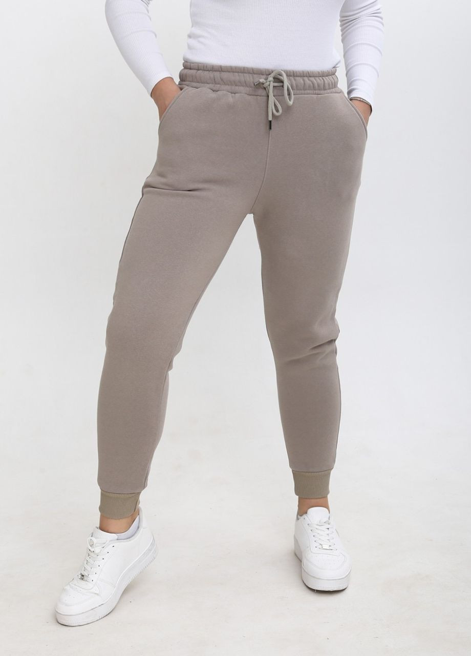 Спортивні штани жіночі на оливковій флісі з манжетом MDG джогери (264918947)