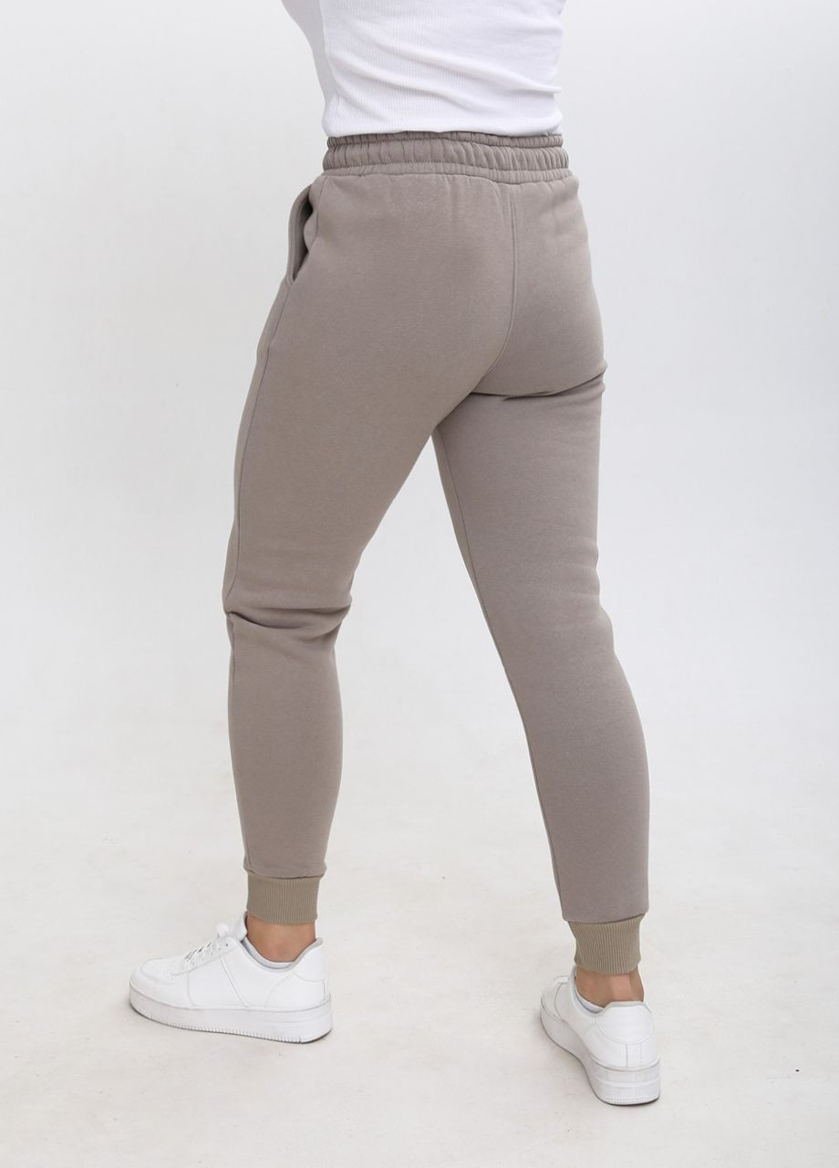 Спортивні штани жіночі на оливковій флісі з манжетом MDG джогери (264918947)