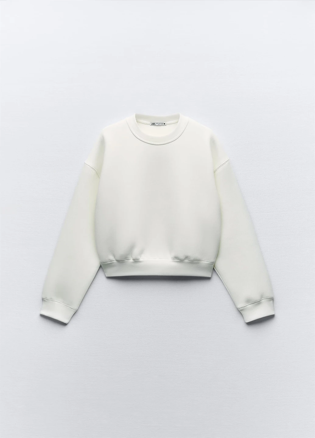 Білий світшот Zara однотонний (268300403)