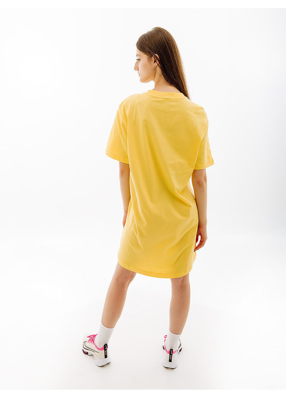 Желтое спортивное женское платье w nsw essntl ss dress tshrt жёлтый Nike однотонное