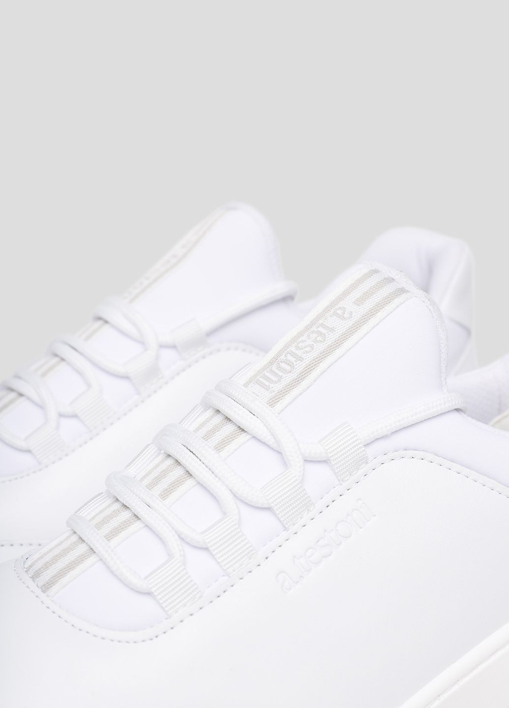 Белые демисезонные белые кроссовки из кожи и текстиля a.Testoni