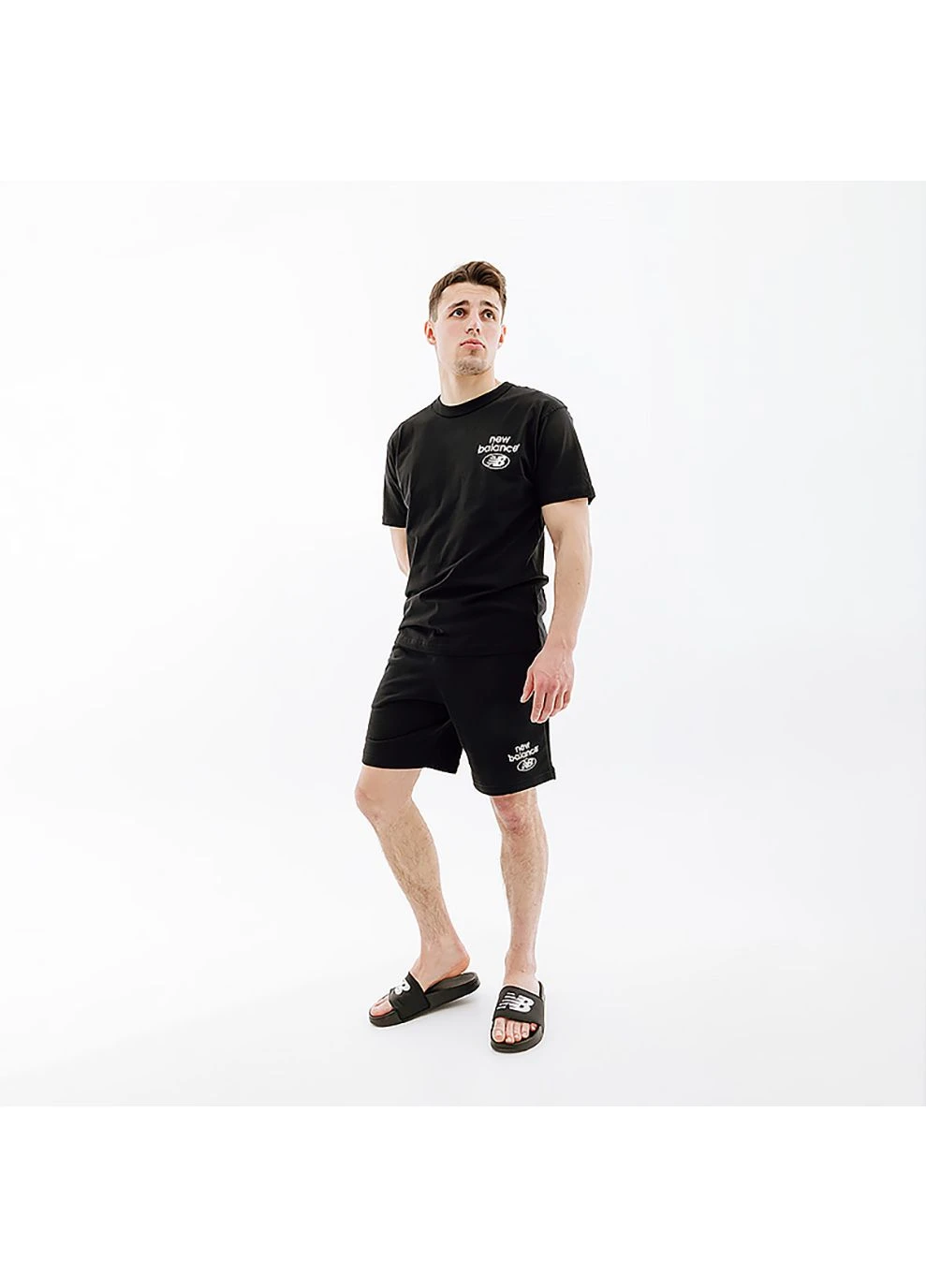 Мужские Шорты Essentials Reimagined Черный New Balance (268746727)