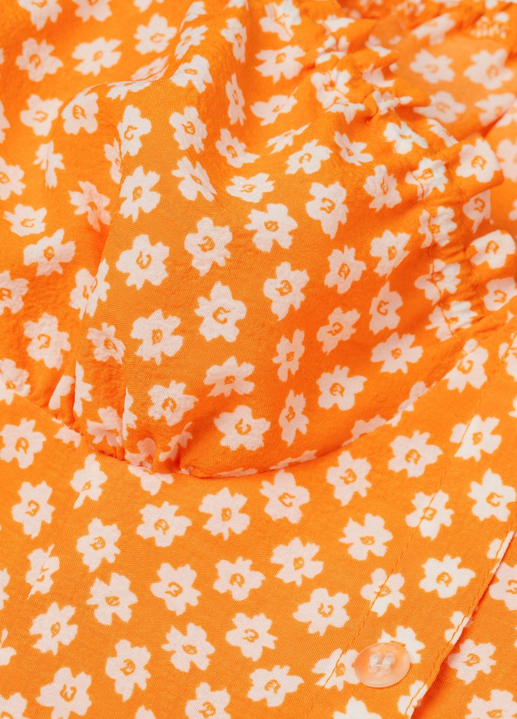 Помаранчева повсякденний сукня H&M з квітковим принтом