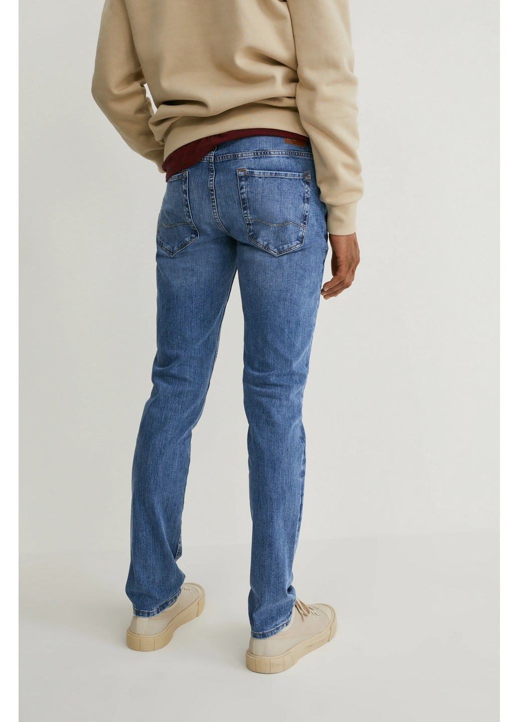 Синие демисезонные джинсы C&A