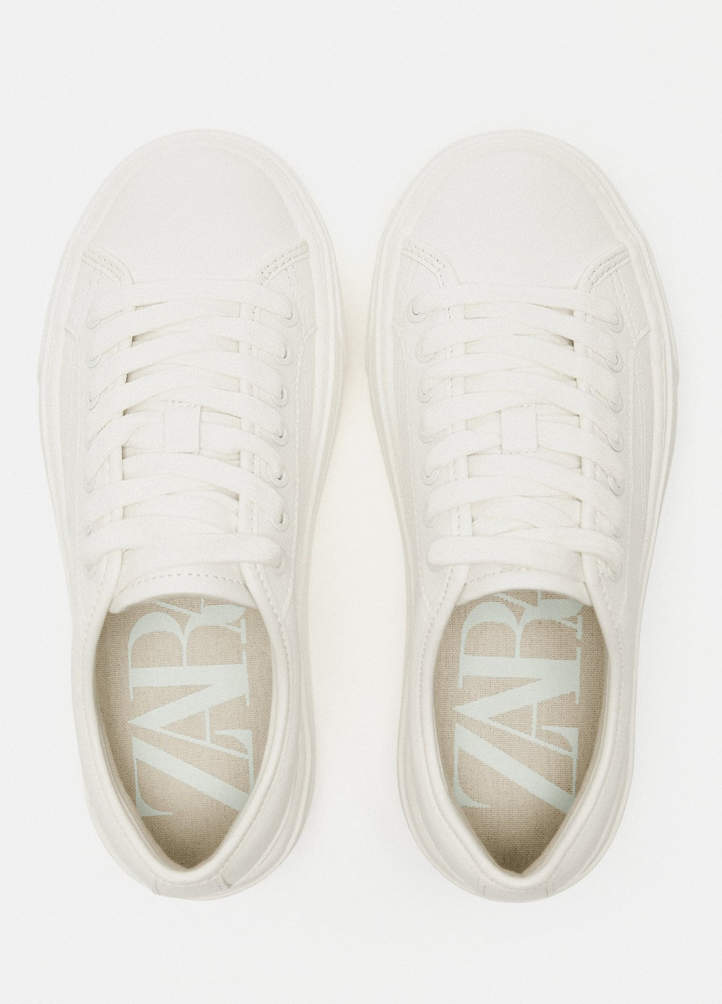 Білі осінні кросівки Zara