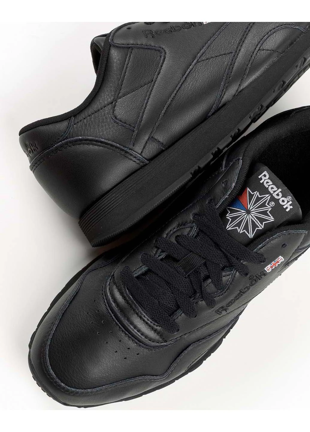 Чорні чоловічі кросівки classic leather plus gv8541 демісезон Reebok
