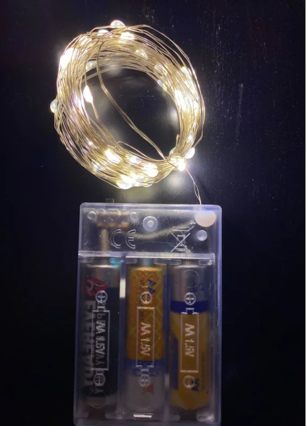 Новорічна гірлянда роса на батарейках 50 LED 5м, теплого білого кольору Brille 1977-07 (256602814)