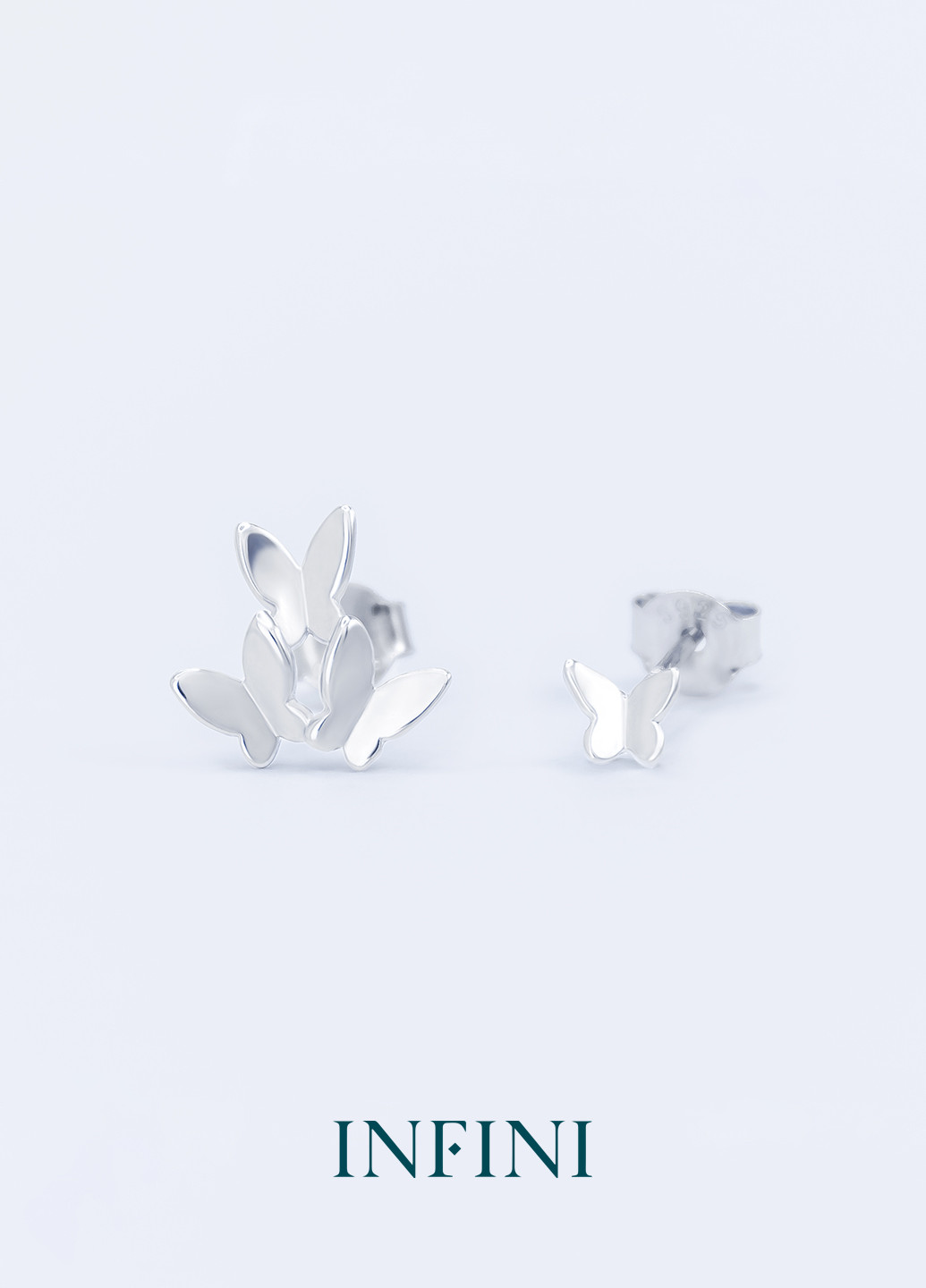 Сережки срібні асиметричні з метеликами Infini (256615134)