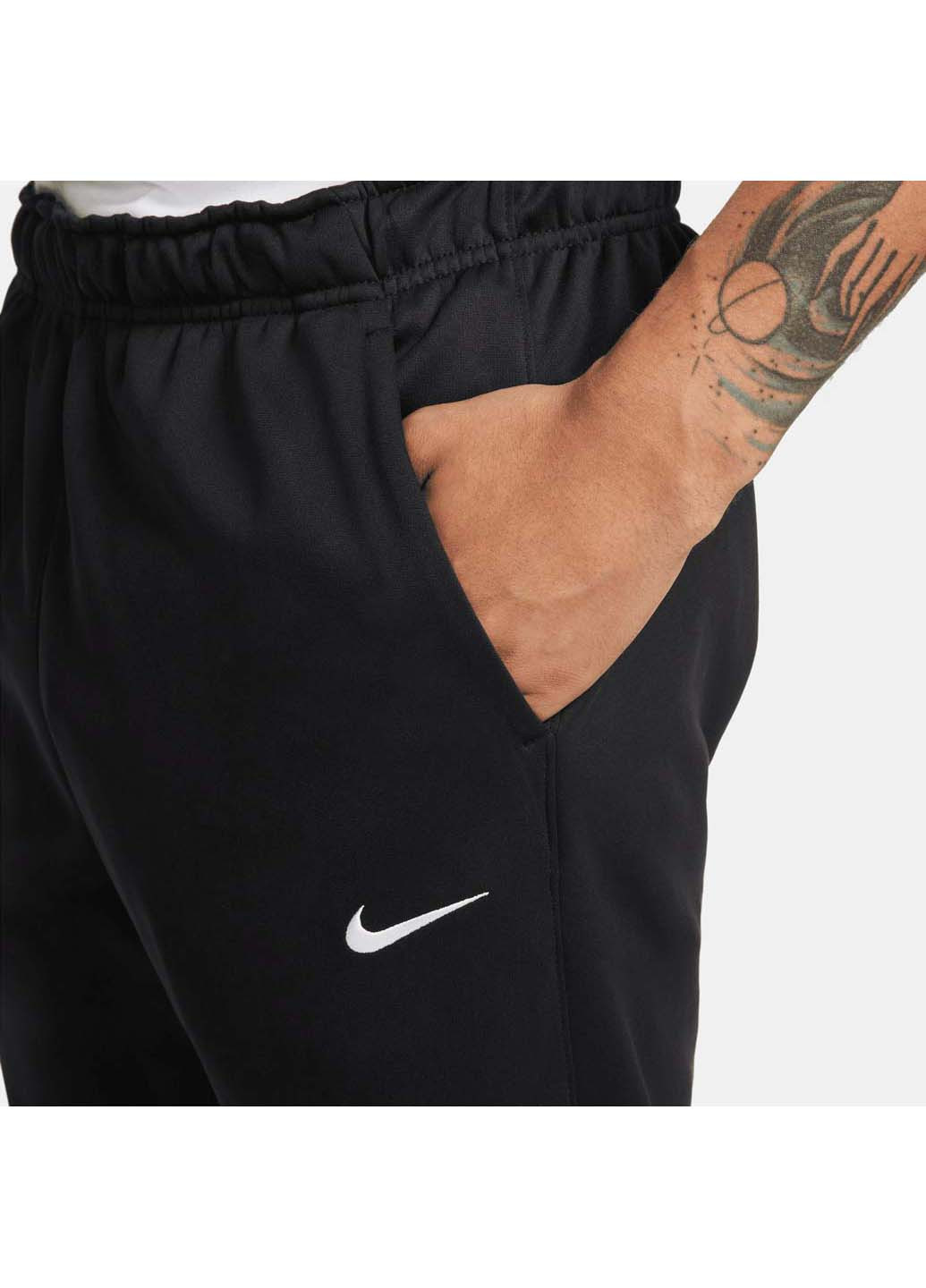 Черные кэжуал демисезонные брюки Nike