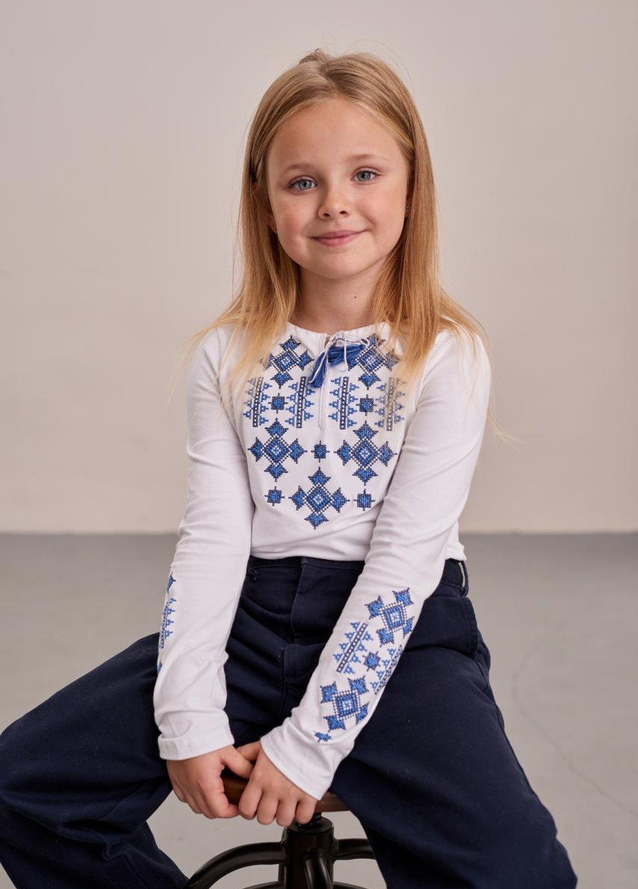Біла трикотажна вишиванка для дівчинки "зоряне сяйво" MEREZHKA візерунок українська символіка бавовна (258287660)