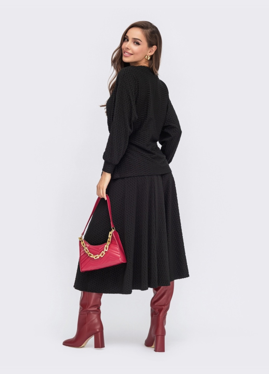 чорний костюм з фактурного трикотажу зі спідницею-напівсонце Dressa (258449517)